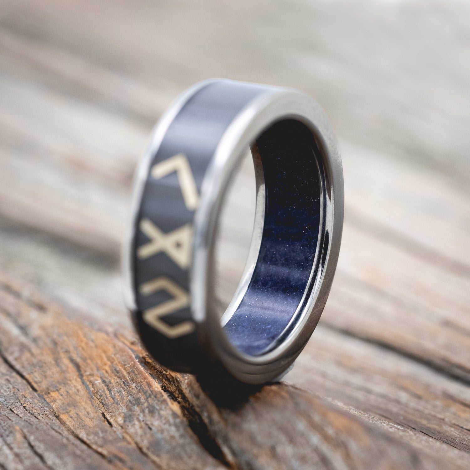 "RAINIER" - WEDDING BAND FEATURING 14K GOLD NORDIC SYMBOLS WITH A SANDBLASTED BACKGROUND AND A BLUE GOLDSTONE LINING-Staghead Designs