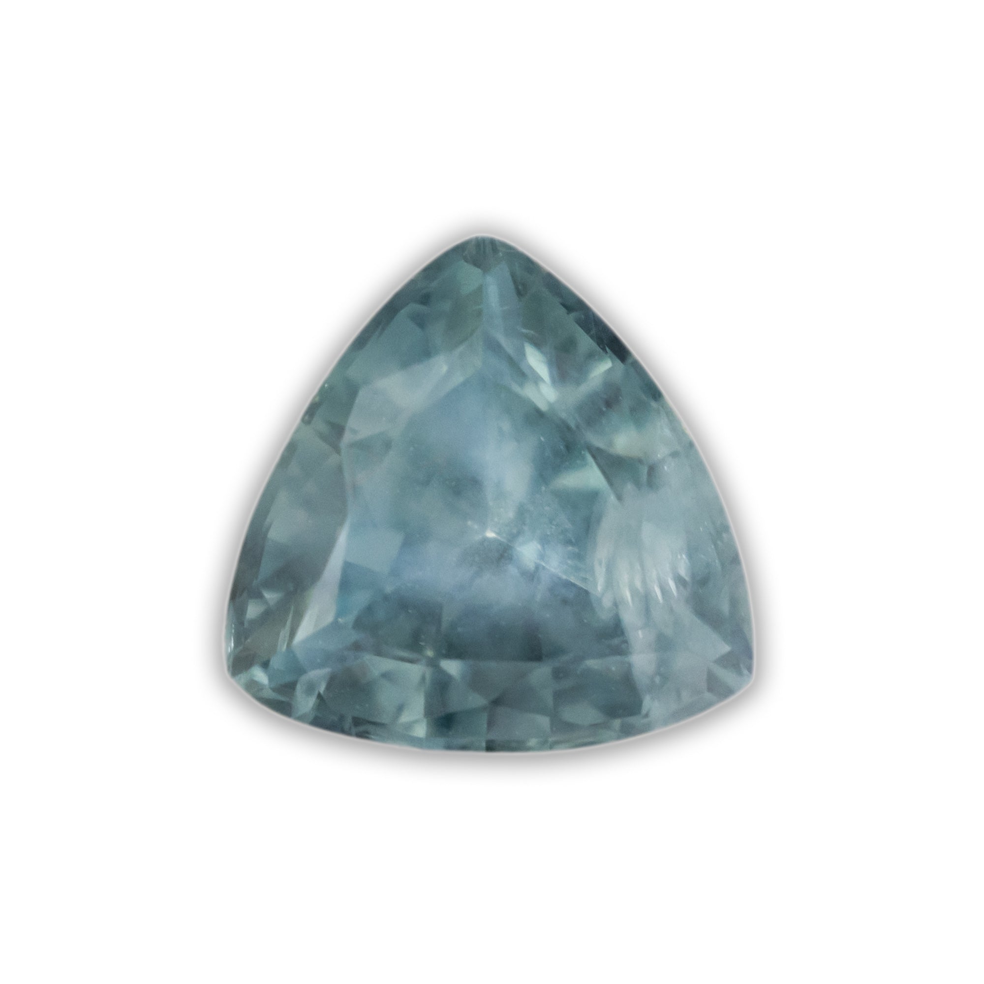 Blue trillion cut sapphire on a white background