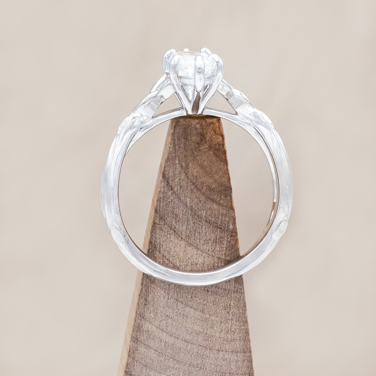 Side view of "Amaris" - Celtic knot-style Moissanite women's engagement ring with diamond accents