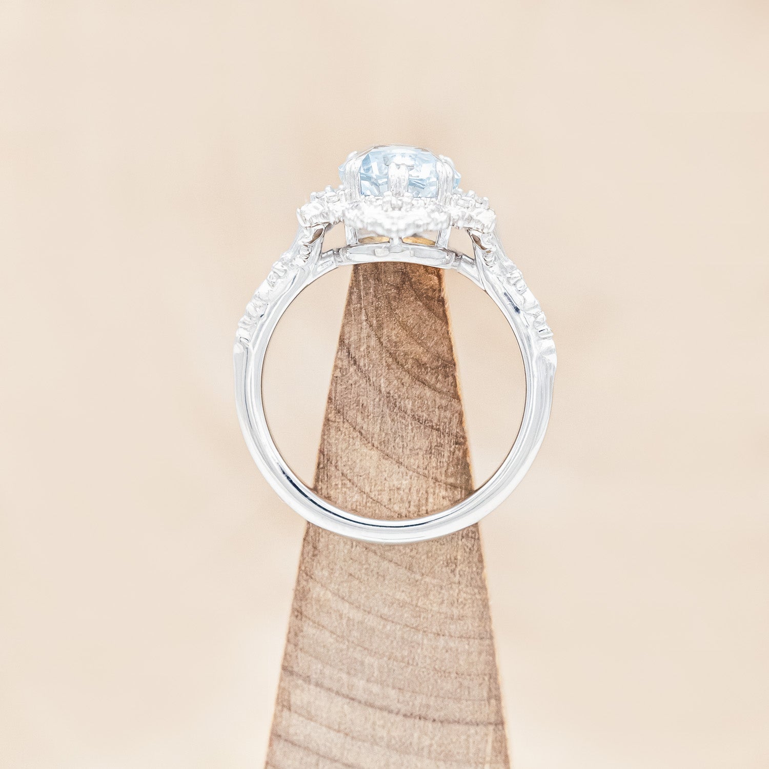 Top view of "Cherie" - sculptural-style aquamarine women's engagement ring with diamond accents