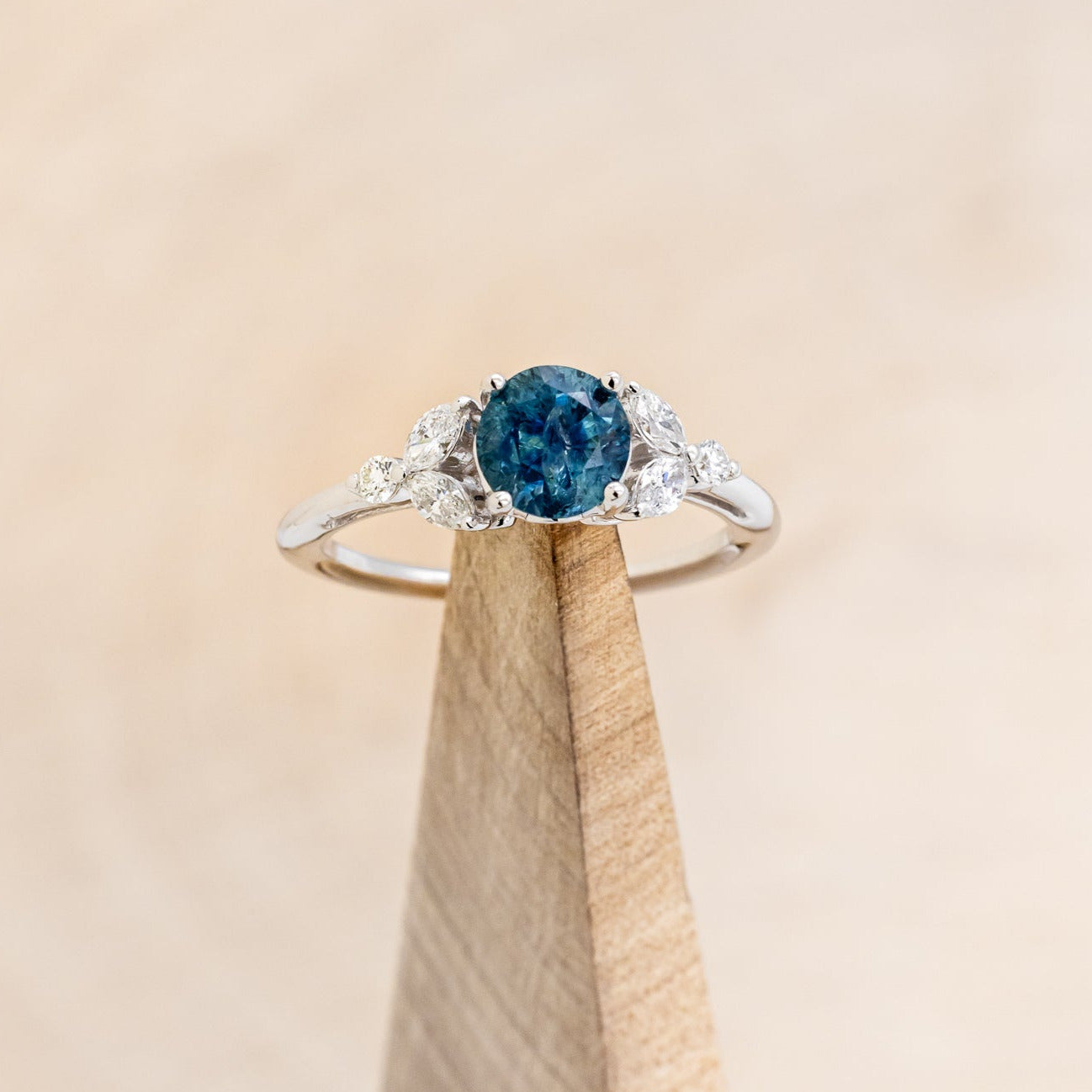 "BLOSSOM" - ROUND CUT MONTANA SAPPHIRE ENGAGEMENT RING WITH LEAF-SHAPED DIAMOND ACCENTS-7