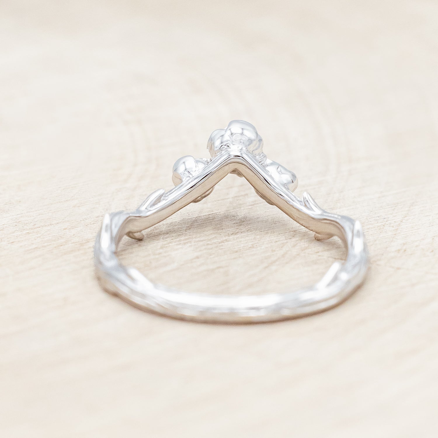 Back view of "Harlow" - floral-inspired tracer