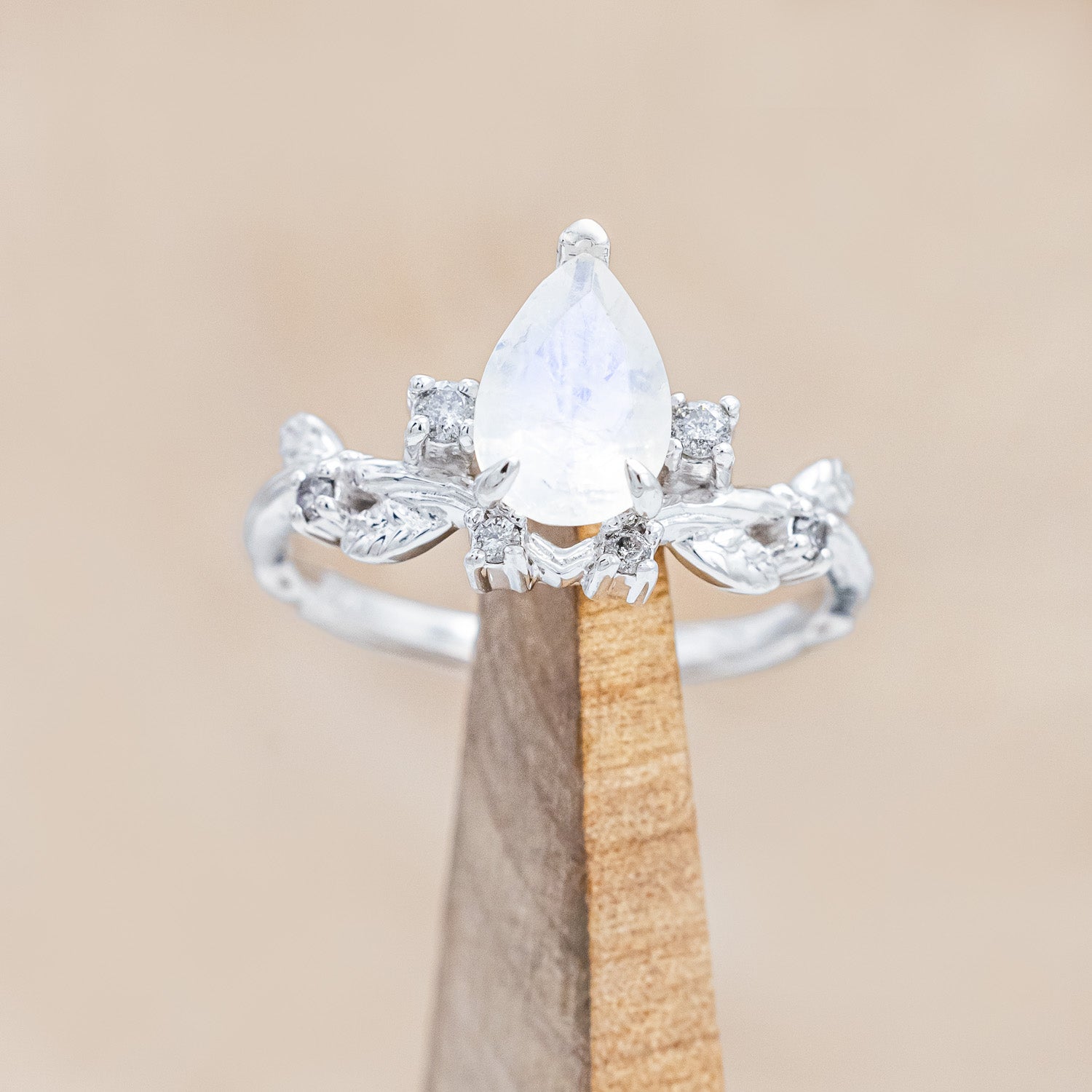 "Harlow" - moonstone women's engagement ring with salt & pepper diamond accents on a branch-inspired band