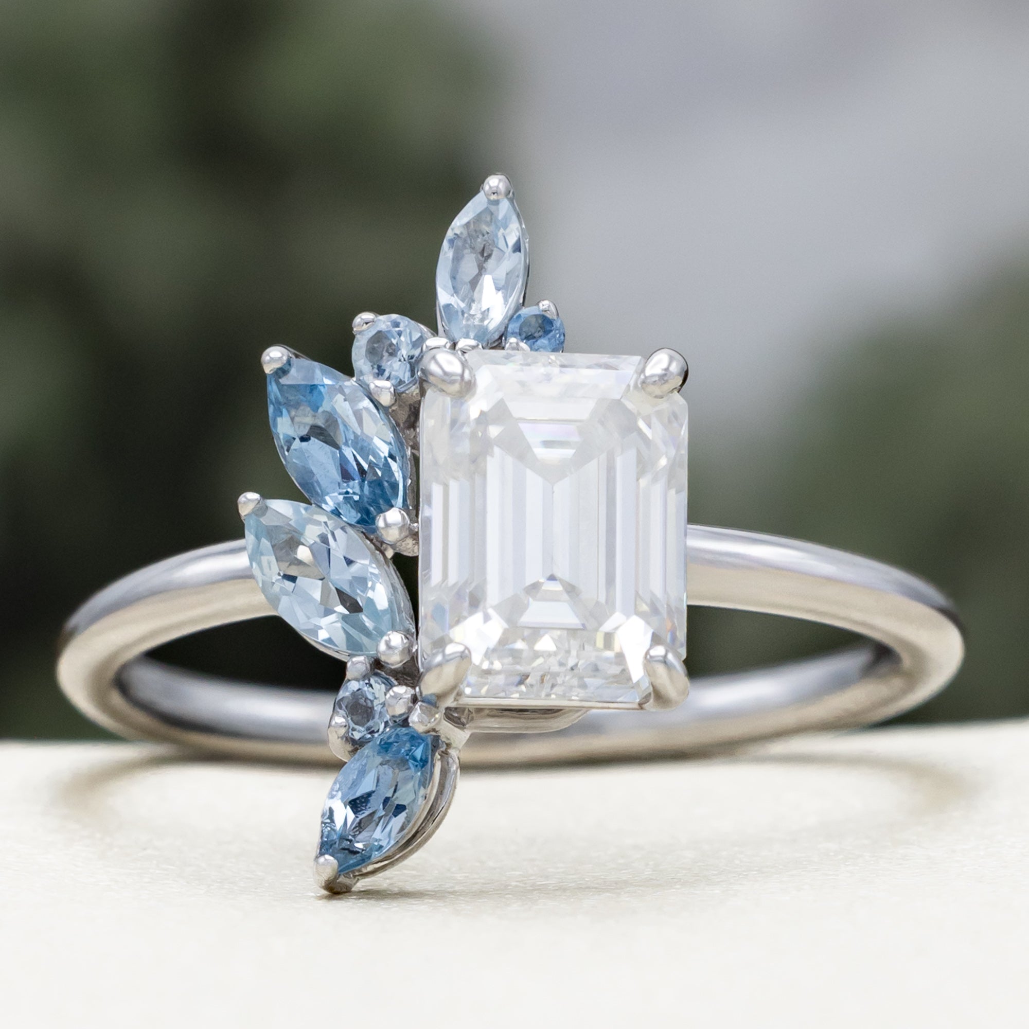 "ISABELLA" - EMERALD CUT MOISSANITE ENGAGEMENT RING WITH AQUAMARINE ACCENTS-Staghead Designs