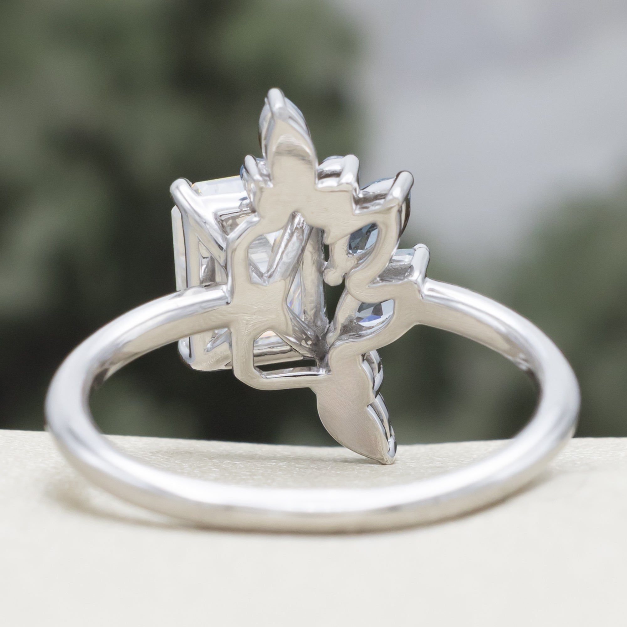 "ISABELLA" - EMERALD CUT MOISSANITE ENGAGEMENT RING WITH AQUAMARINE ACCENTS-Staghead Designs