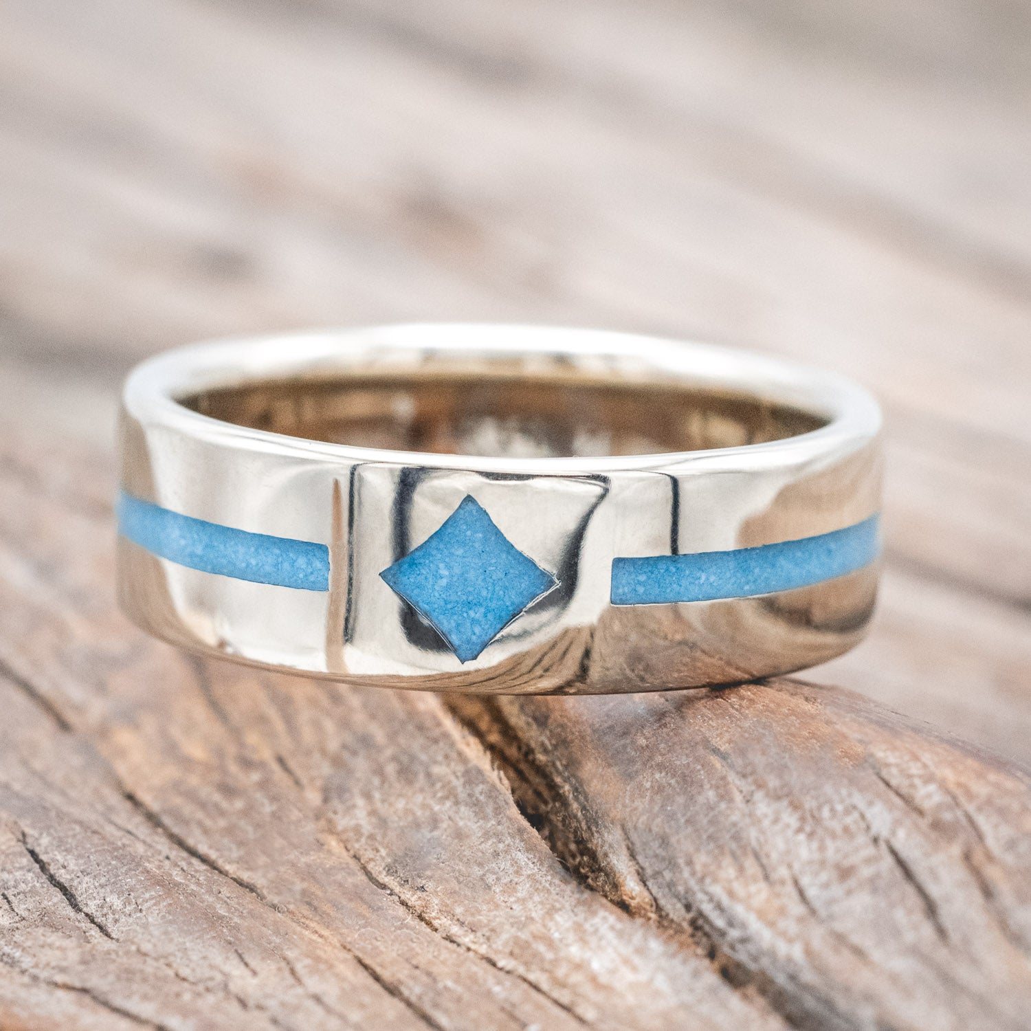 "Maddox" men's wedding ring featuring centered custom channel and diamond-shaped turquoise inlays