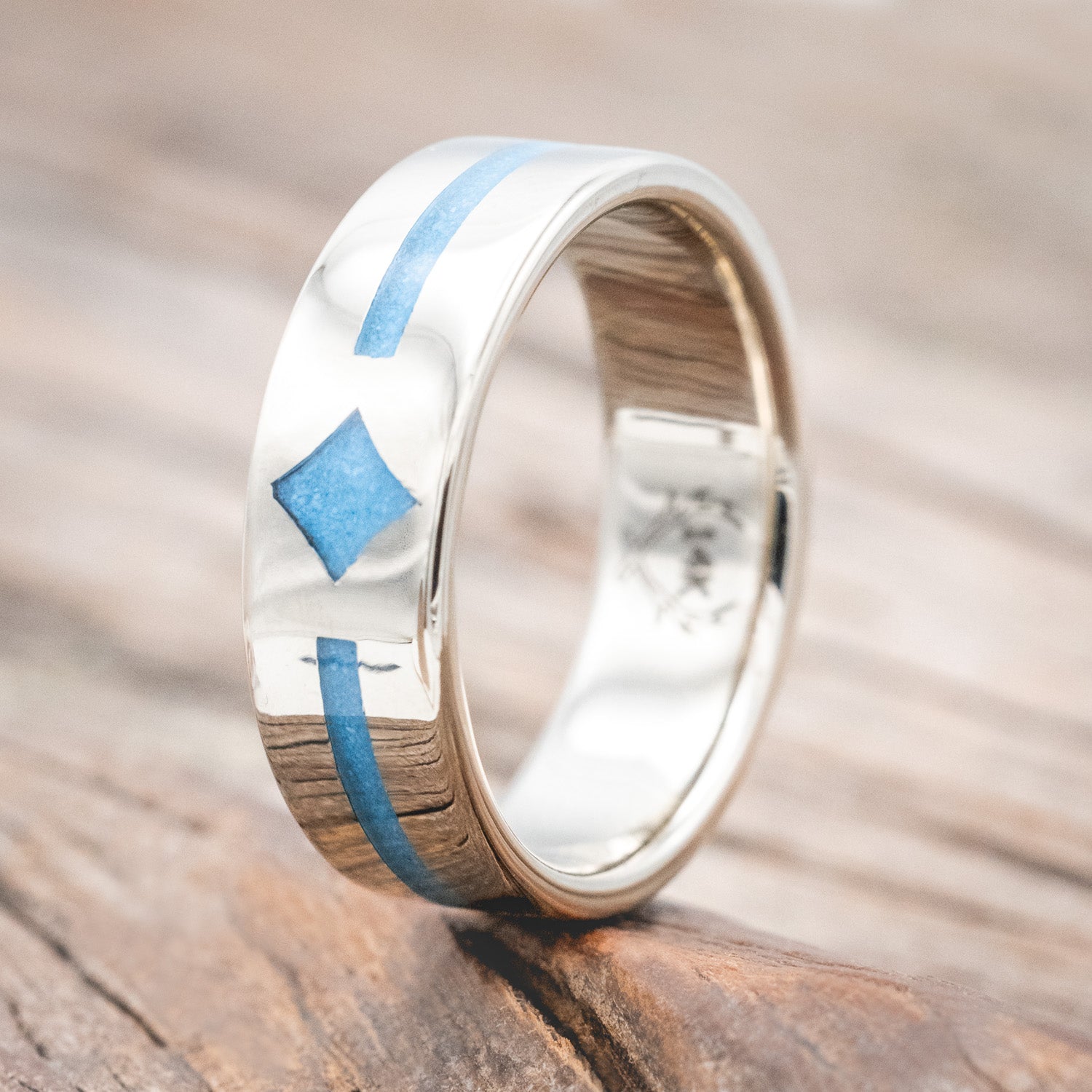 "Maddox" men's wedding ring featuring centered custom channel and diamond-shaped turquoise inlays