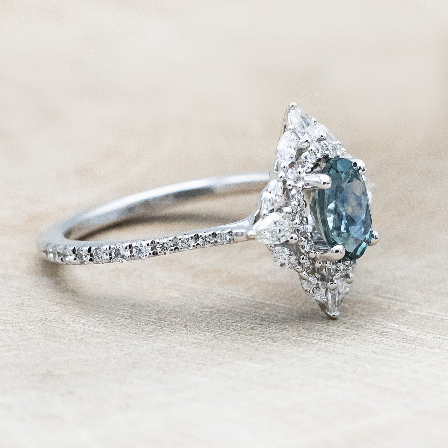 "NORTH STAR" - OVAL CUT MONTANA SAPPHIRE ENGAGEMENT RING WITH DIAMOND HALO & ACCENTS-Staghead Designs