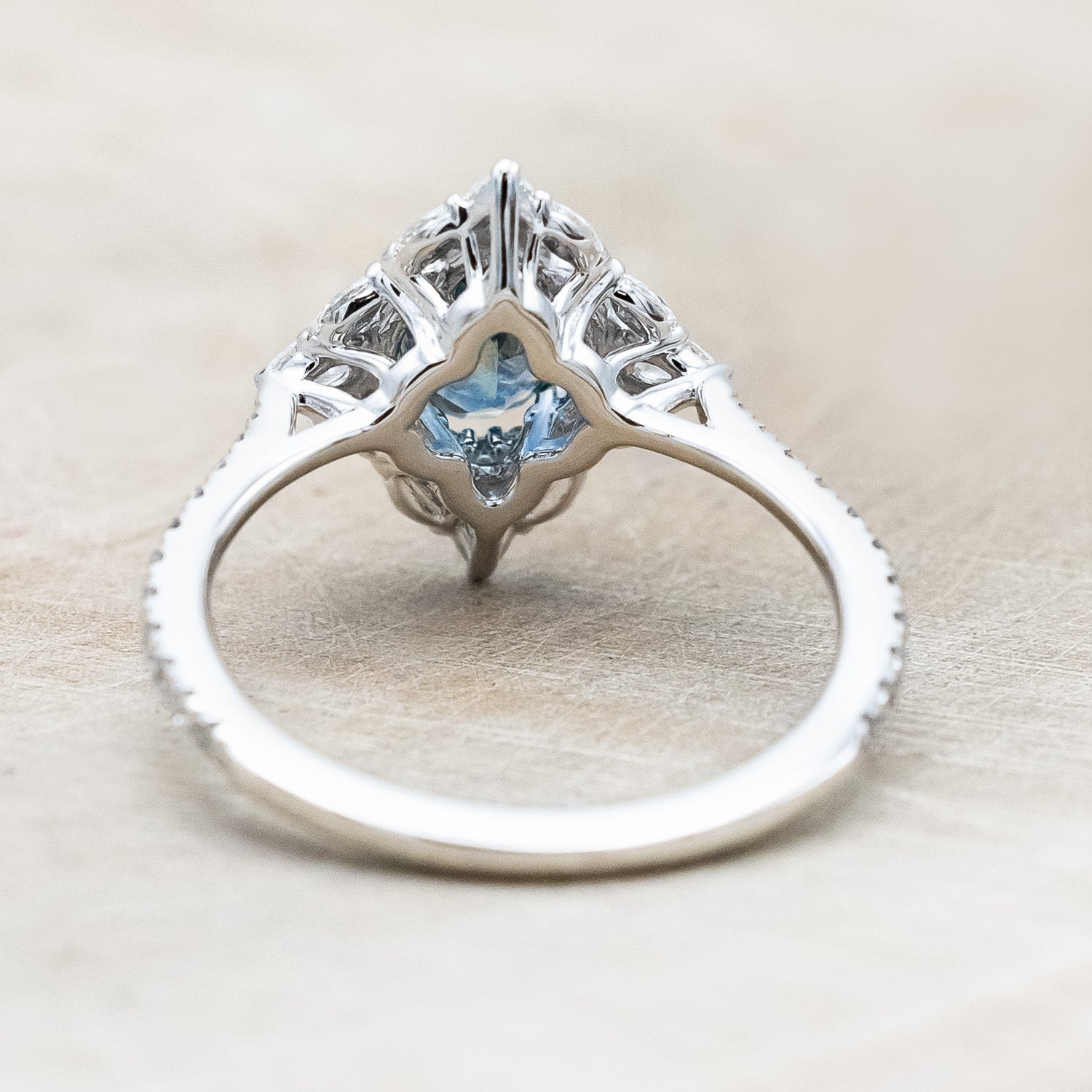 "NORTH STAR" - OVAL CUT MONTANA SAPPHIRE ENGAGEMENT RING WITH DIAMOND HALO & ACCENTS-Staghead Designs