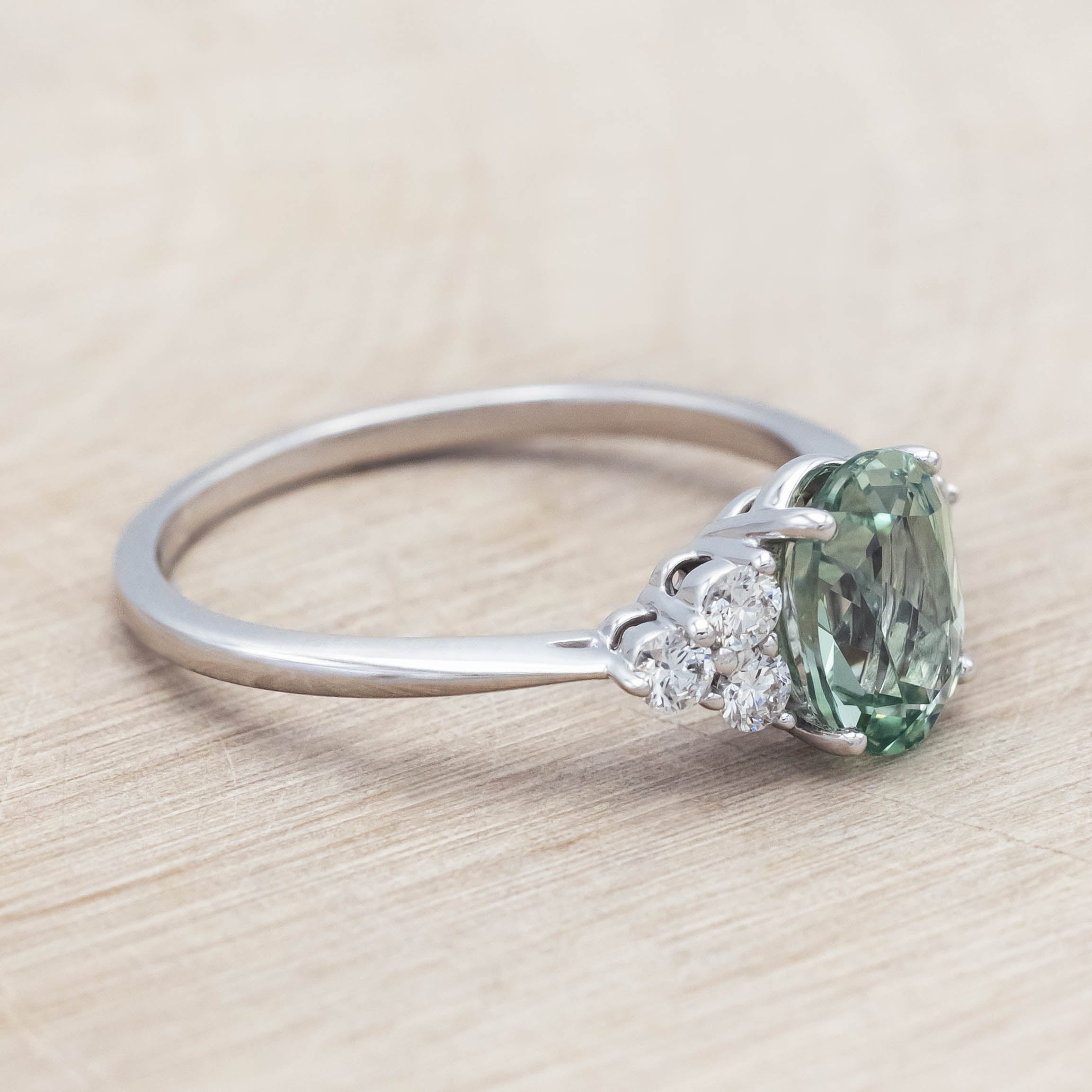 "RHEA" - OVAL CUT LAB-GROWN GREEN SAPPHIRE ENGAGEMENT RING WITH DIAMOND ACCENTS-Staghead Designs