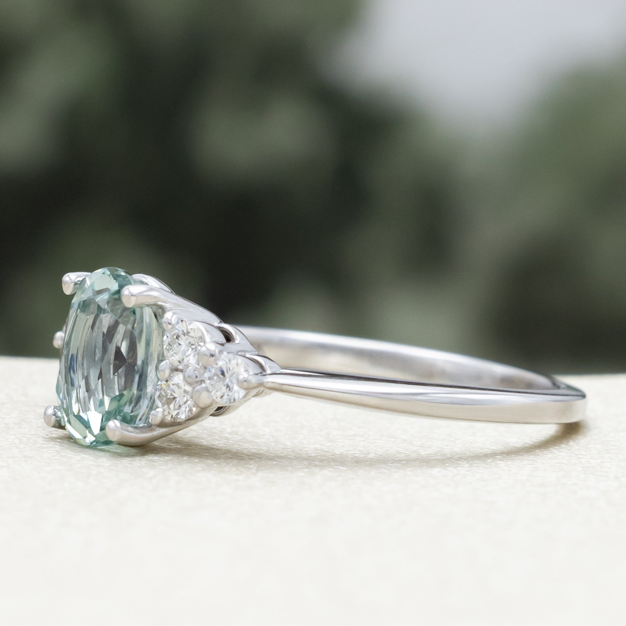 "RHEA" - OVAL CUT LAB-GROWN GREEN SAPPHIRE ENGAGEMENT RING WITH DIAMOND ACCENTS-Staghead Designs