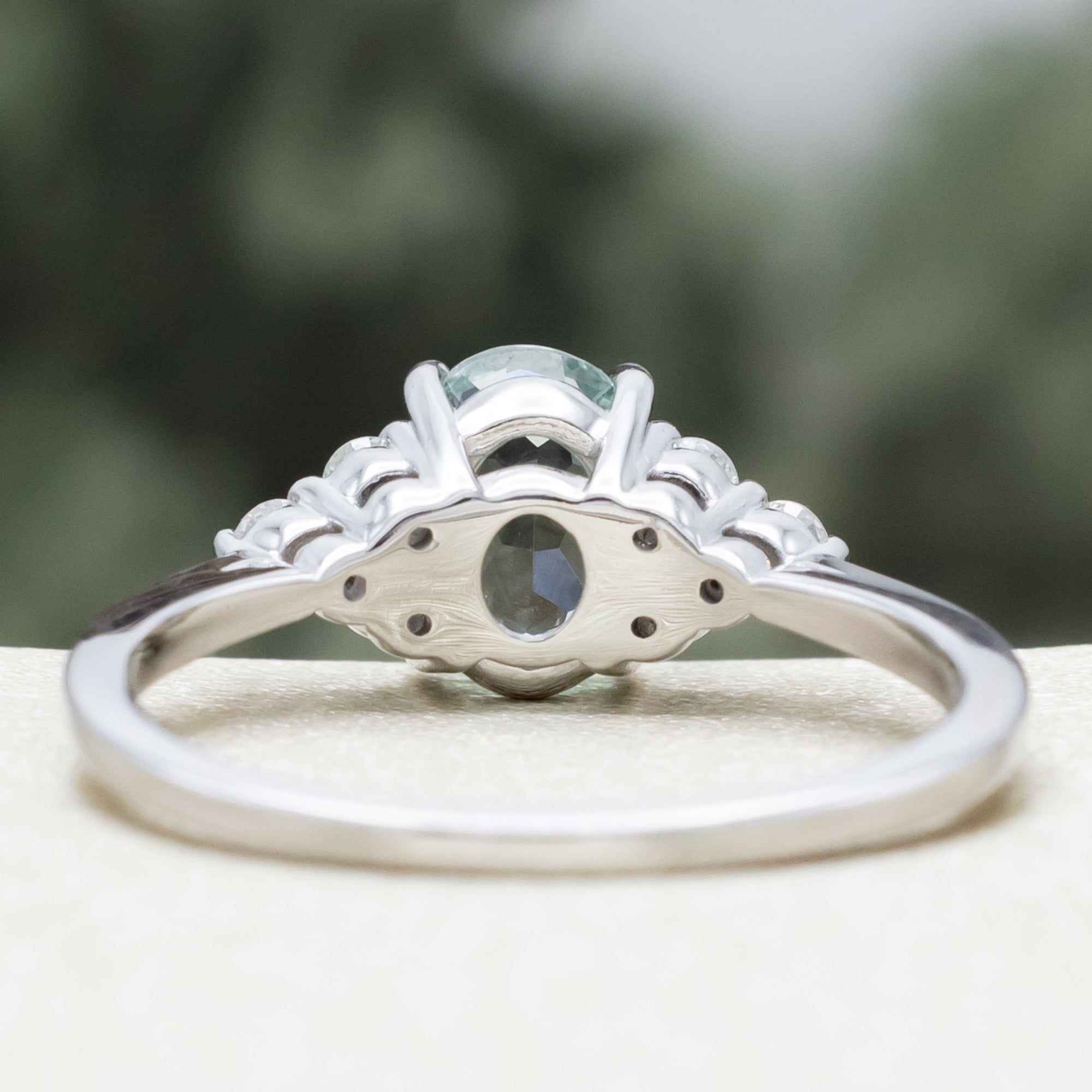 "RHEA" - OVAL CUT LAB-GROWN GREEN SAPPHIRE ENGAGEMENT RING WITH DIAMOND ACCENTS-Staghead Designs