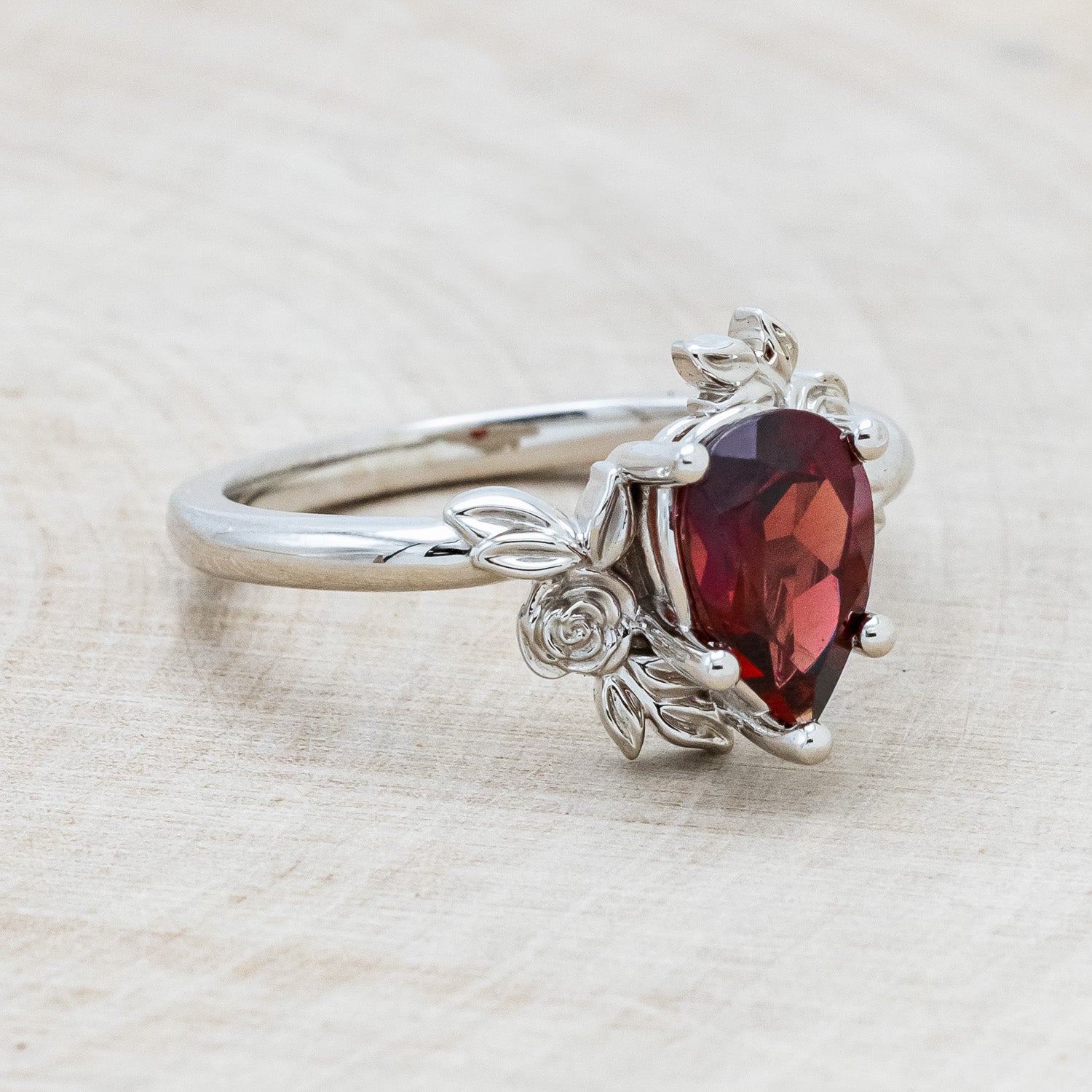 "ROSA" - PEAR CUT MOZAMBIQUE GARNET ENGAGEMENT RING WITH FLOWER ACCENTS-2