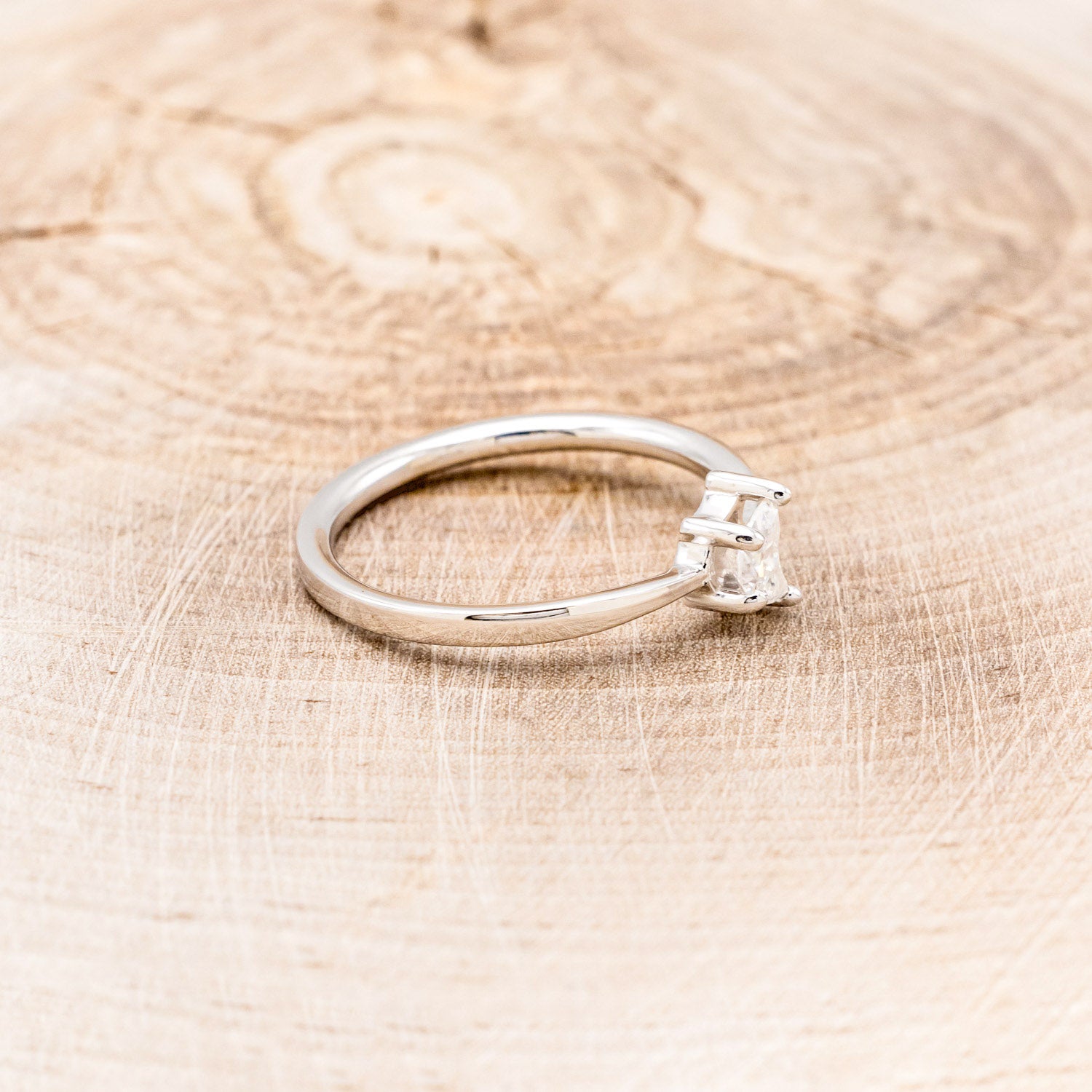 DAINTY SOLITAIRE ENGAGEMENT RING WITH A CRESCENT CUT MOISSANITE CENTER STONE-Staghead Designs