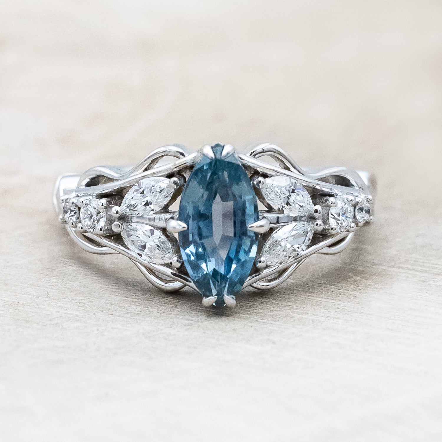 "Amarie" - diamond accented engagement ring with an abstract filigree cutout
