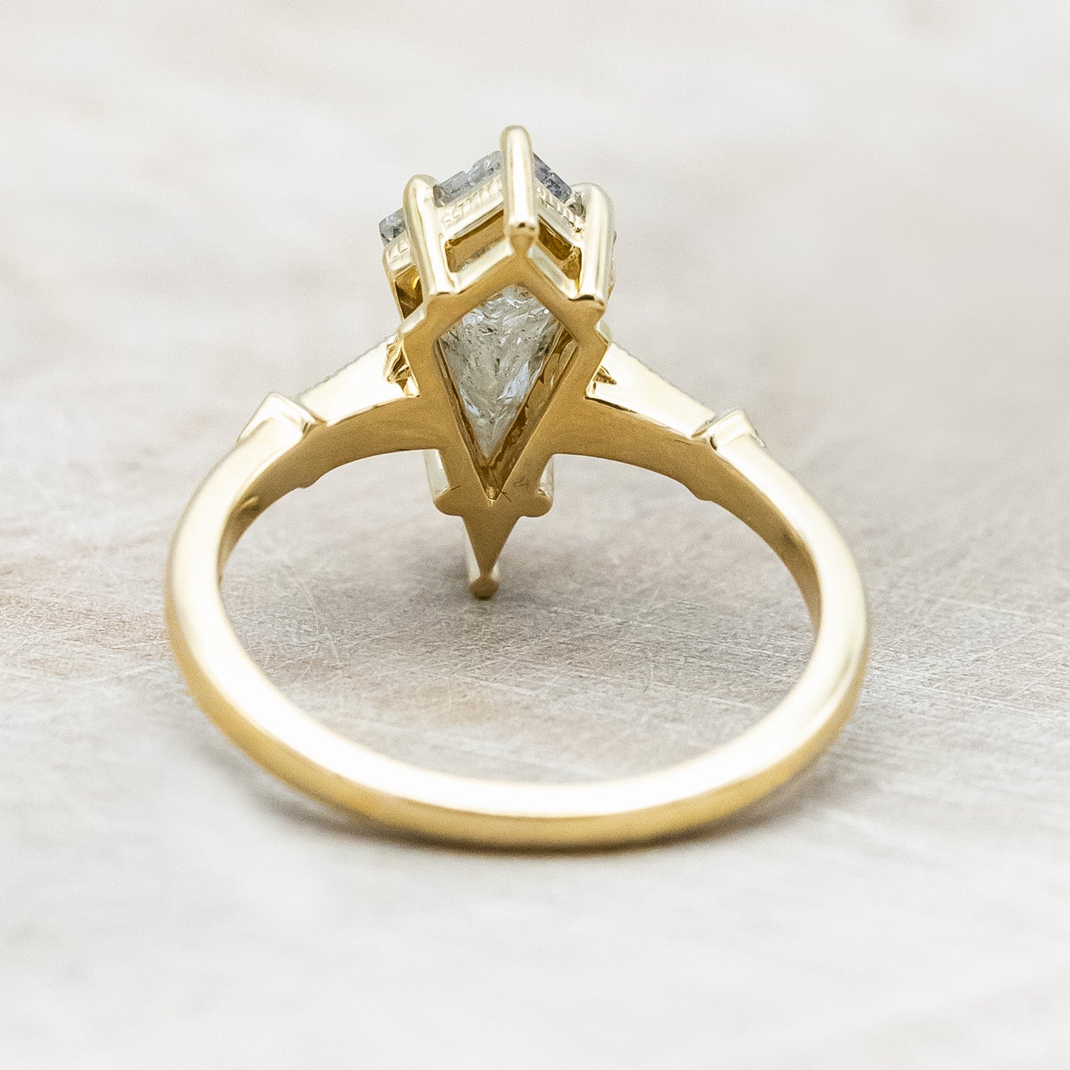 Back view of "Annora" - vintage-style women's engagement ring with kite step cut salt & pepper diamond & diamond accents in 14K yellow gold