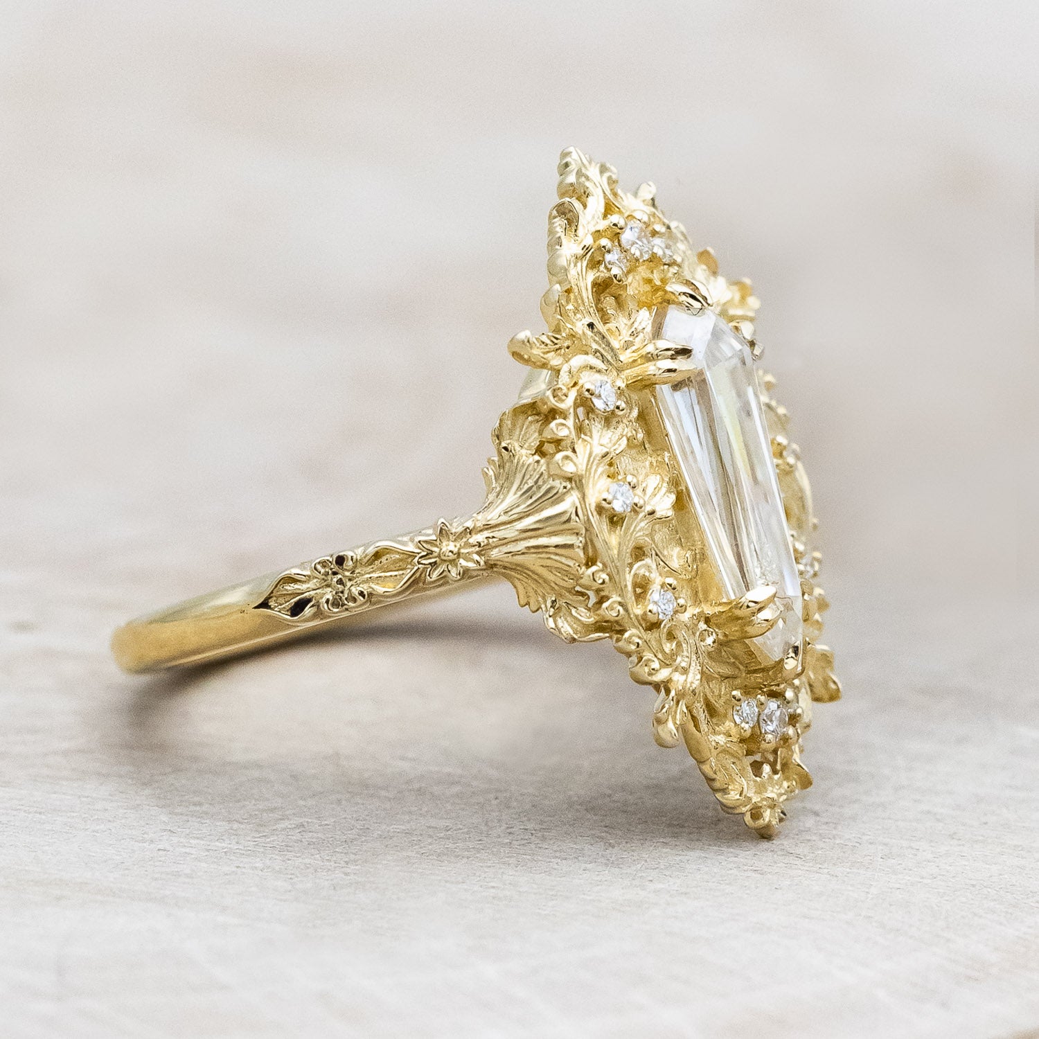 Side view of "Cherie" - rococo-inspired Moissanite women's engagement ring with diamond accents