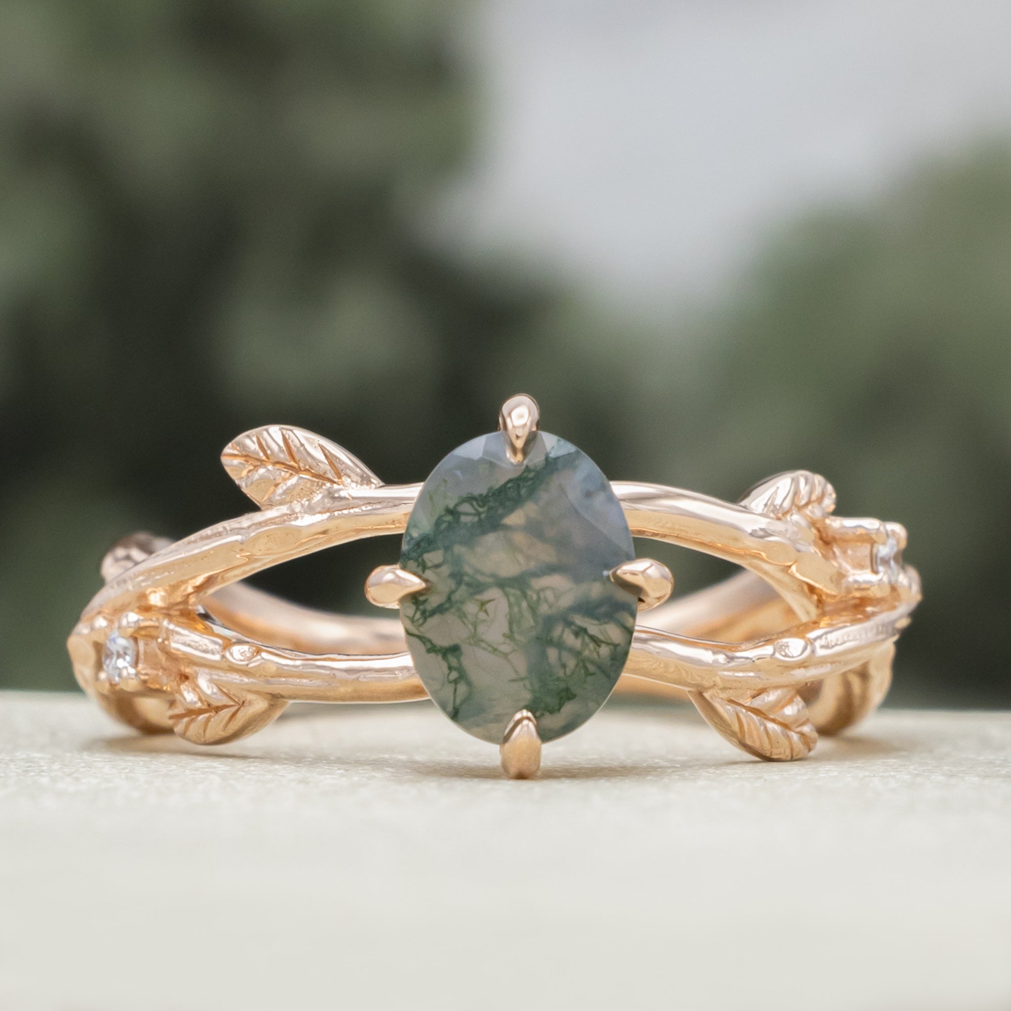 "Artemis On The Vine" - Oval Cut Moss Agate Engagement Ring With Diamond Accents & A Branch-Style Band-Staghead Designs