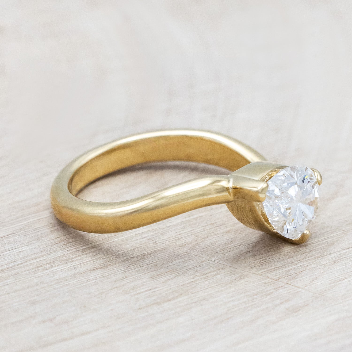 Side view of "Sybil" - asymmetrical solitaire-style lab diamond women's engagement ring