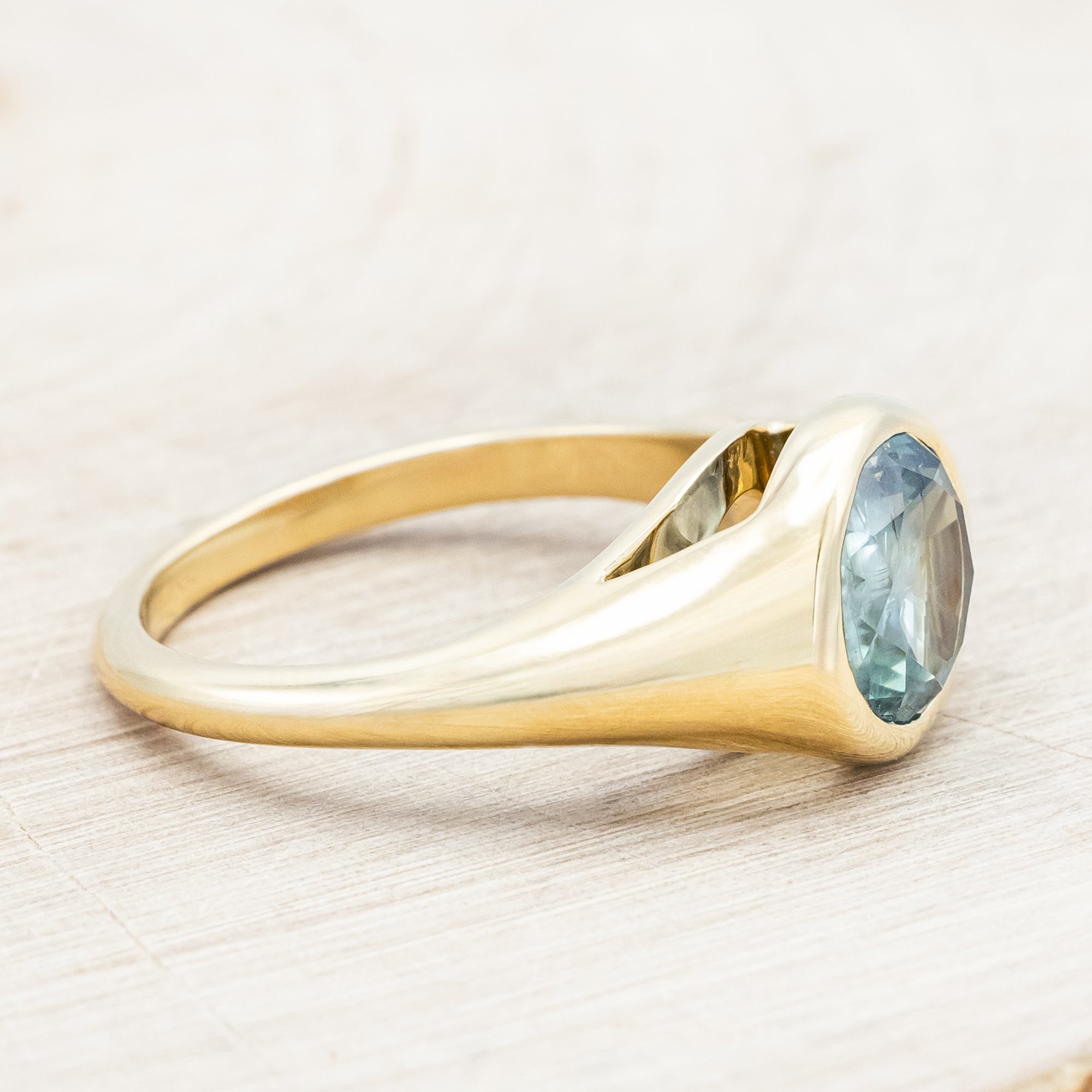 ONE-OF-A-KIND - "MARIANA" - SOLITAIRE ENGAGEMENT RING WITH BEZEL-SET ROUND CUT MONTANA SAPPHIRE-Staghead Designs