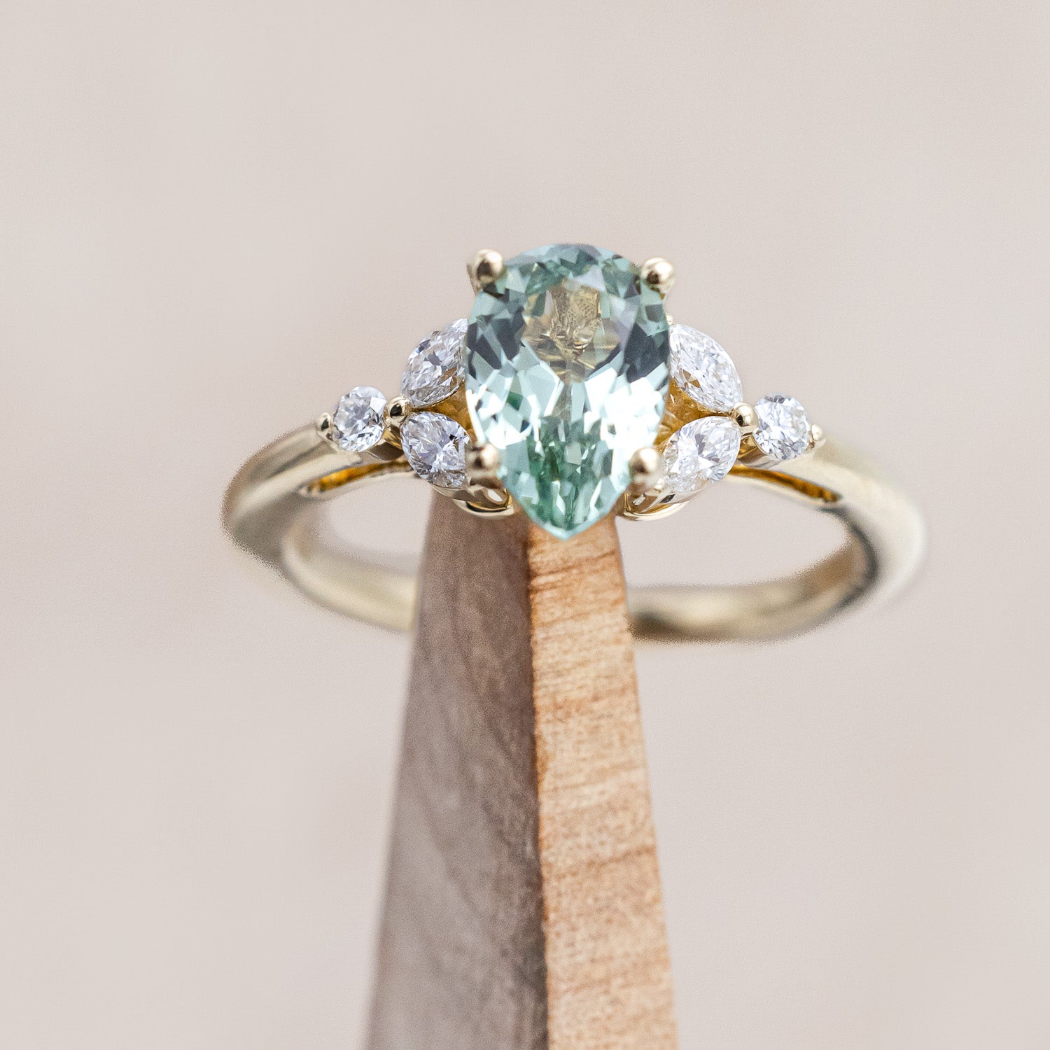 "Blossom" - pear cut lab-grown green sapphire women's engagement ring with diamond accents