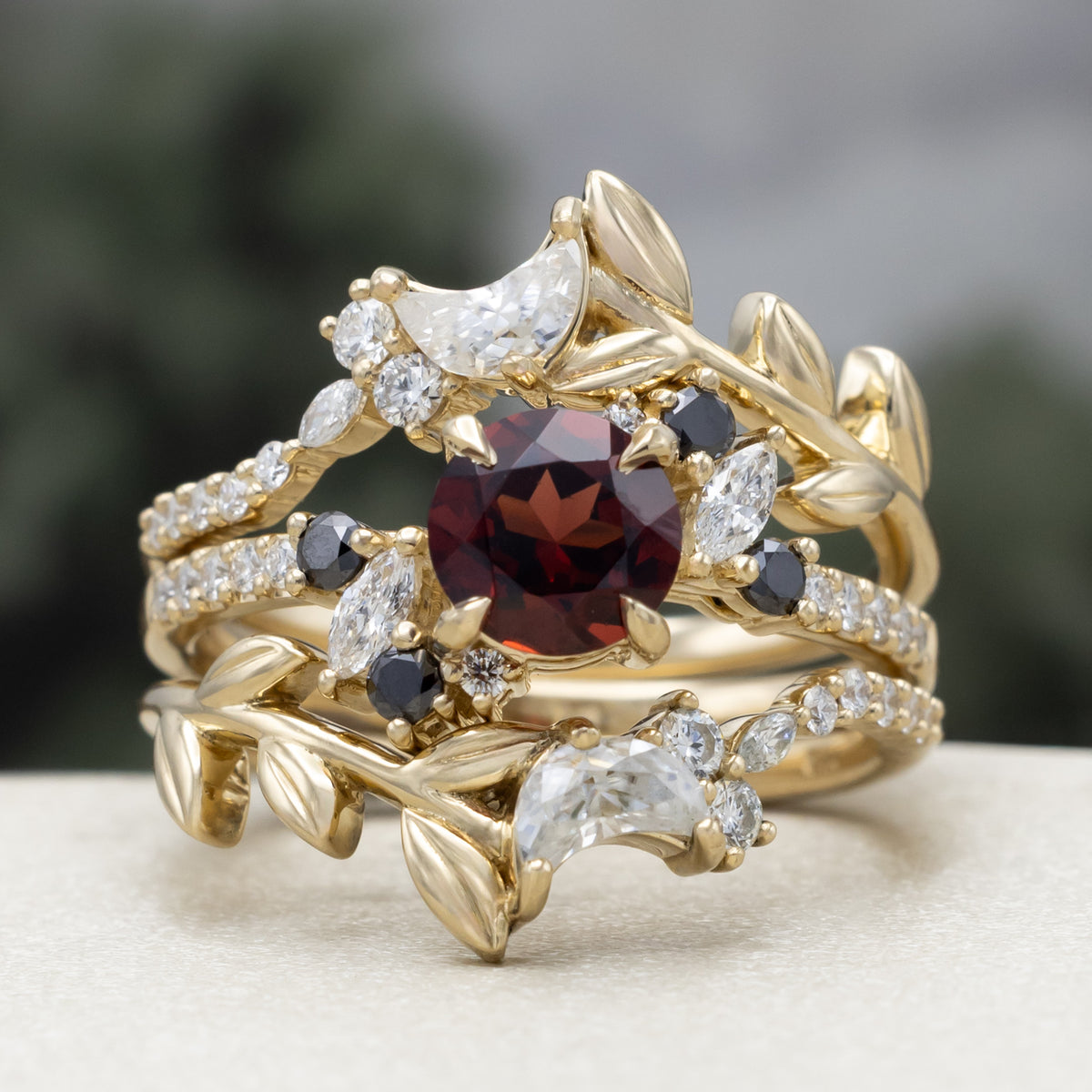 "Demeter" - Bridal Suite - Round Cut Garnet Engagement Ring With Black & White Diamond Accents & Two Diamond Tracers With Crescent Moon Accents-Staghead Designs