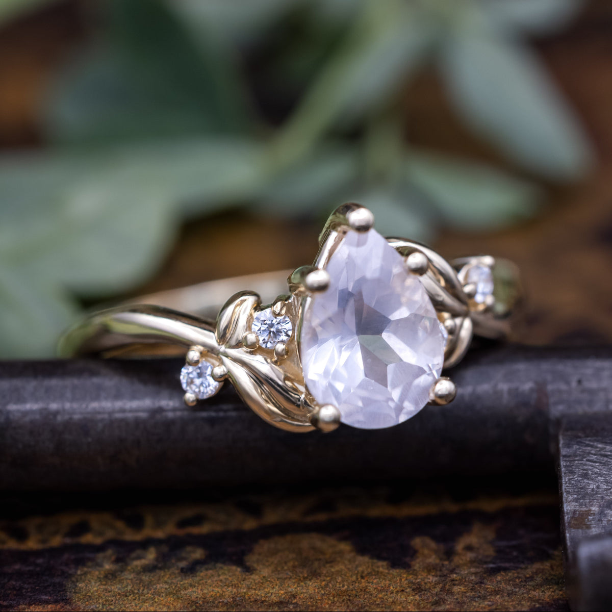 "Gladys" - Pear Cut Rose Quartz Engagement Ring With Diamond Accents On A Floral-Style Band
