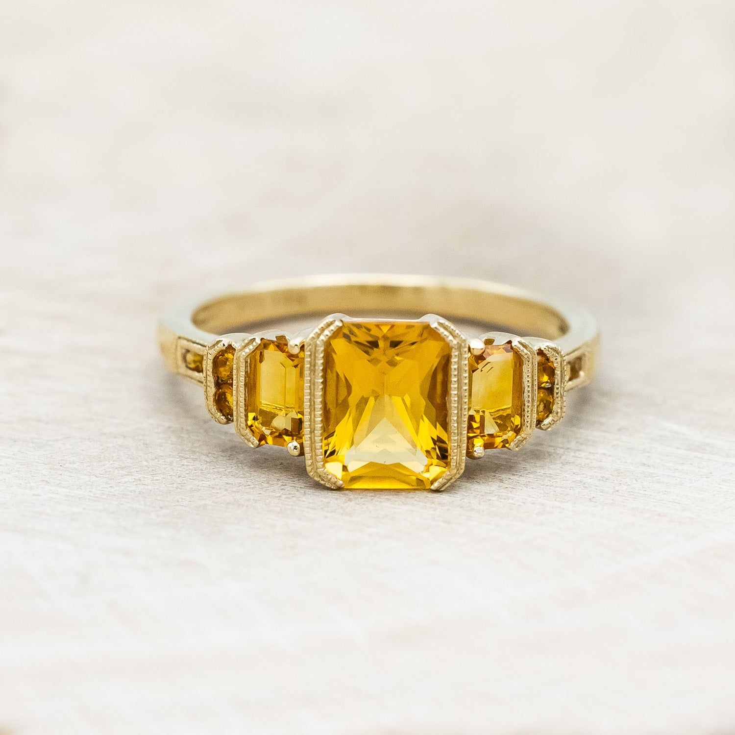 "Hazel" - accented-style citrine women's engagement ring with citrine accents on a 14K gold miligrain band