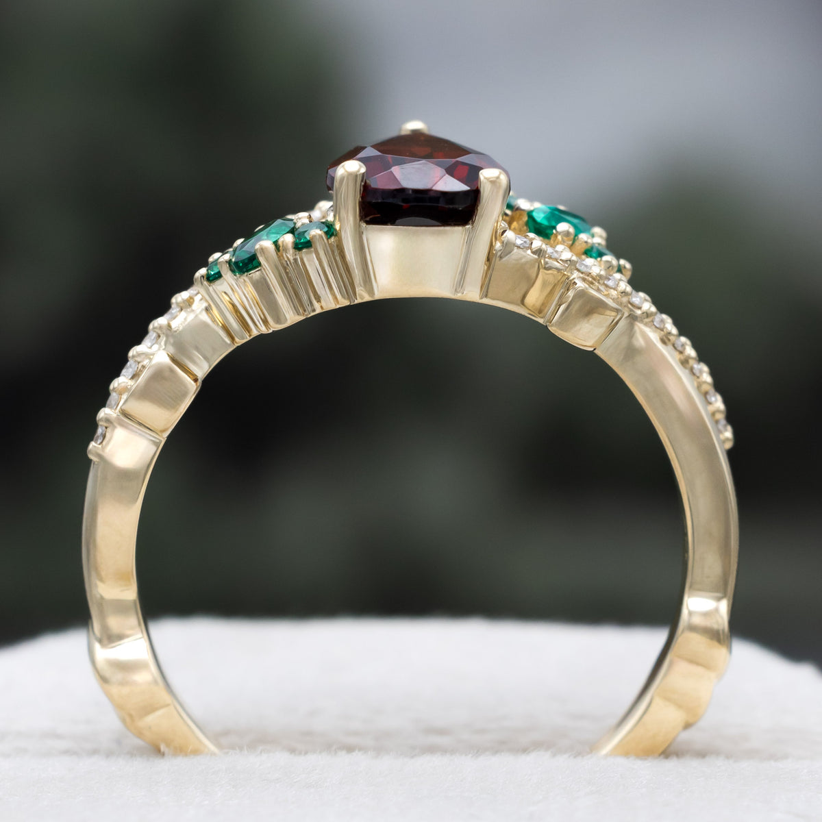"Kamila" - Pear Cut Mozambique Garnet Engagement Ring With Lab-Grown Emerald & Diamond Accents-Staghead Designs