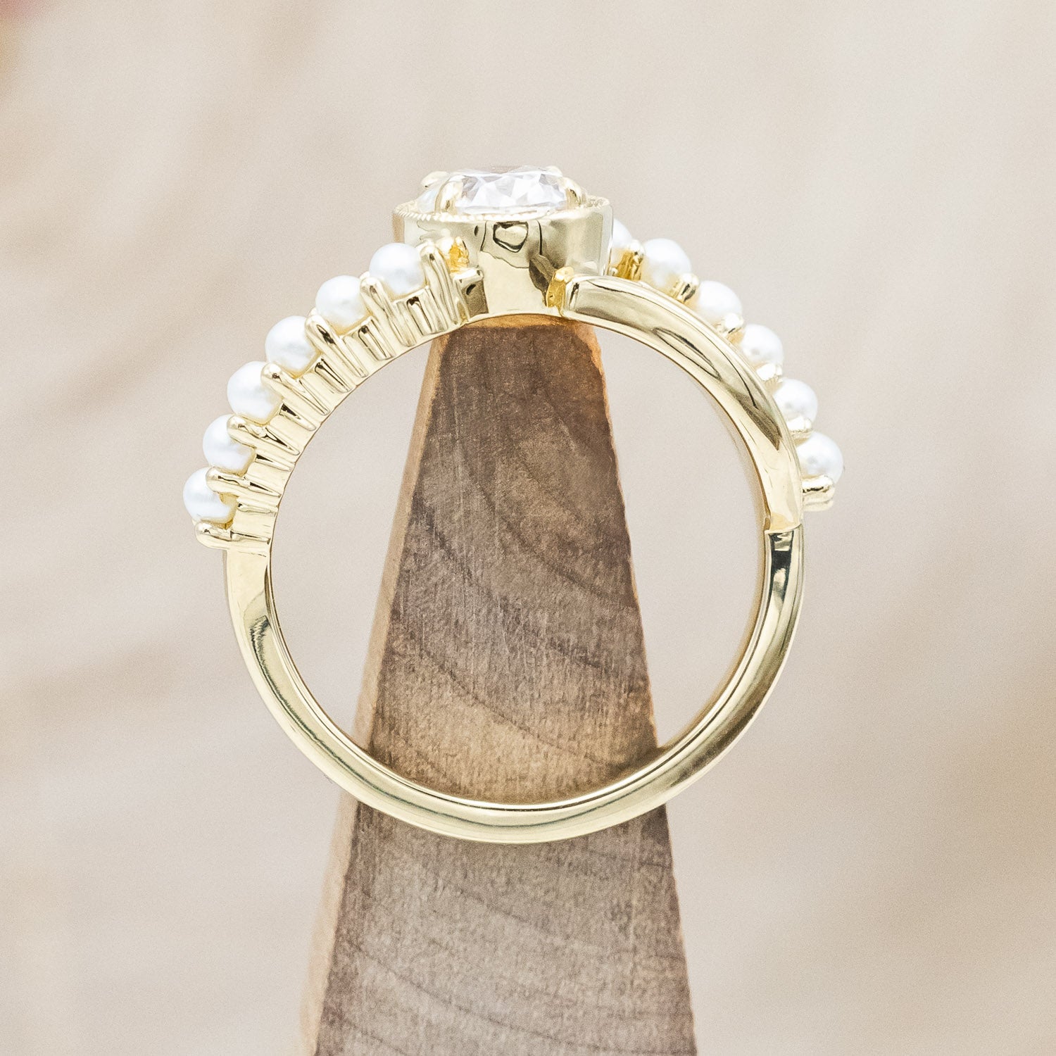 "Lily" an oval cut moissanite women's engagement ring with pearl accents