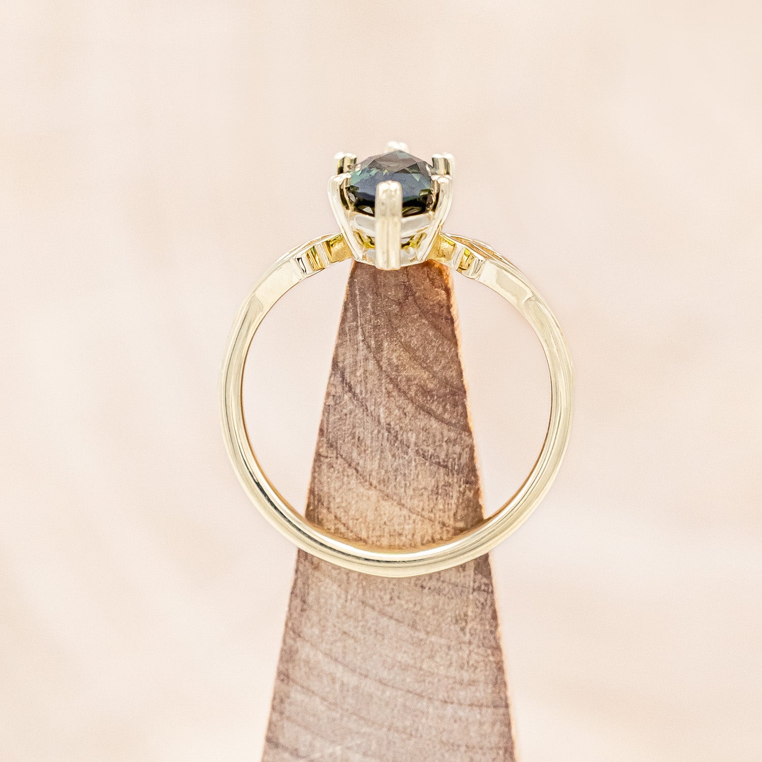 Top view of "Morrigan" - solitaire Australian sapphire women's engagement ring on an ornate 14K yellow gold band