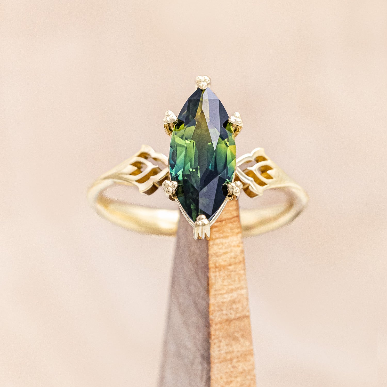 "Morrigan" - solitaire Australian sapphire women's engagement ring on an ornate 14K yellow gold band