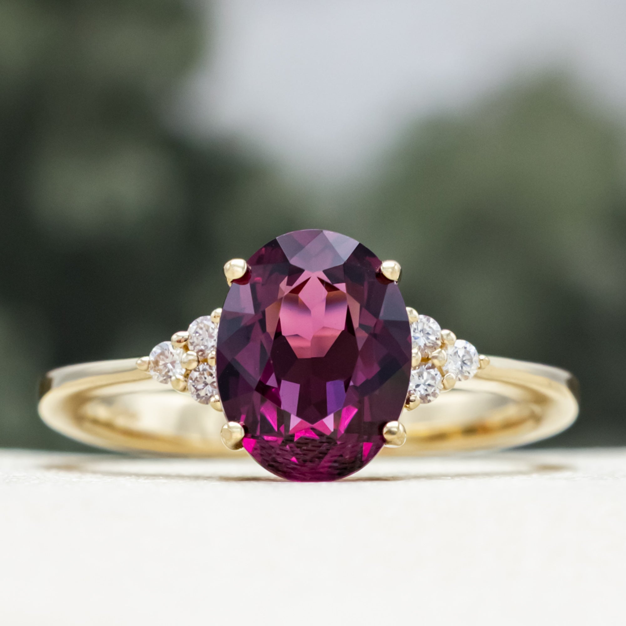 "RHEA" - OVAL CUT RHODOLITE GARNET ENGAGEMENT RING WITH DIAMOND ACCENTS-Staghead Designs