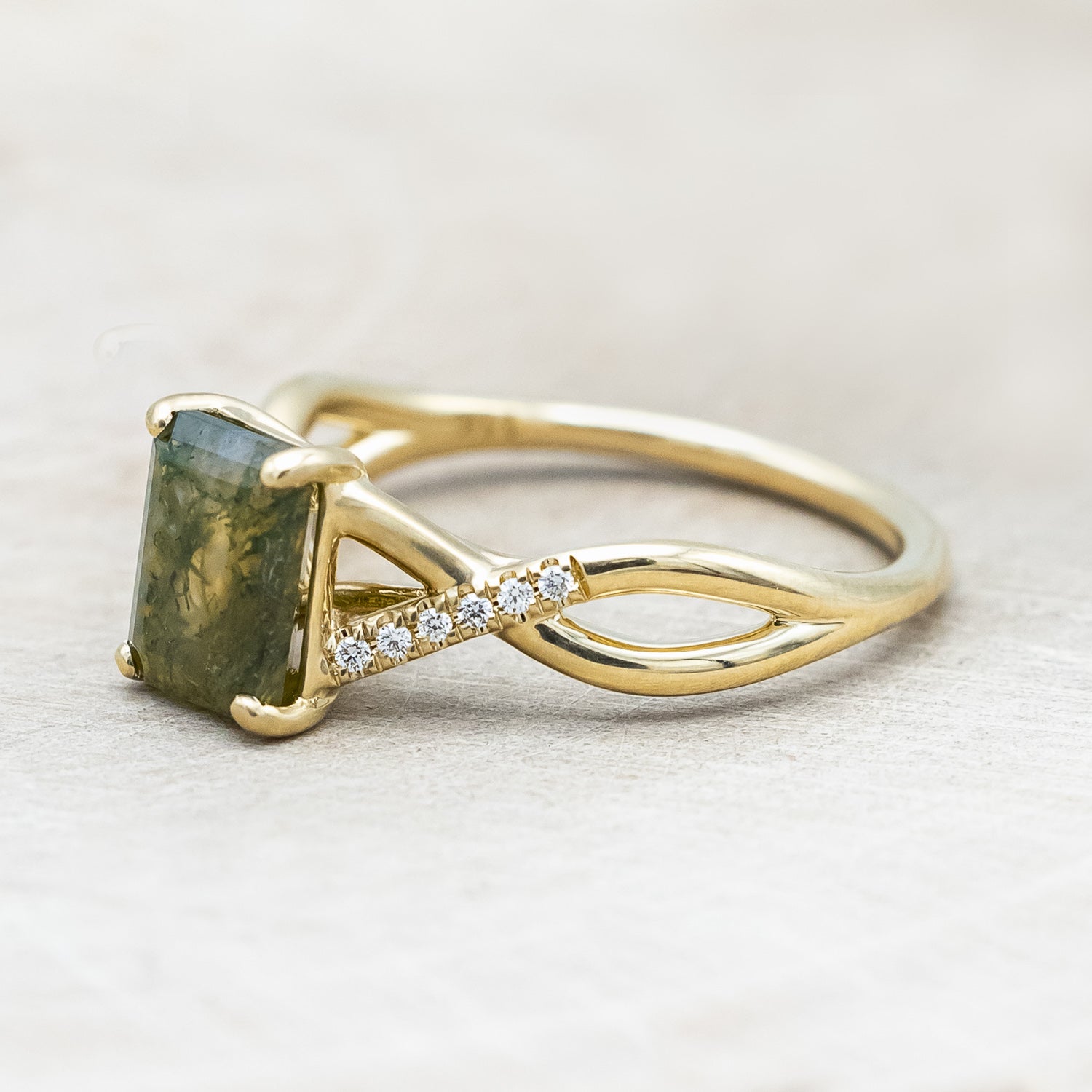 Side view of "Roslyn" - emerald cut moss agate women's engagement ring with diamond accents
