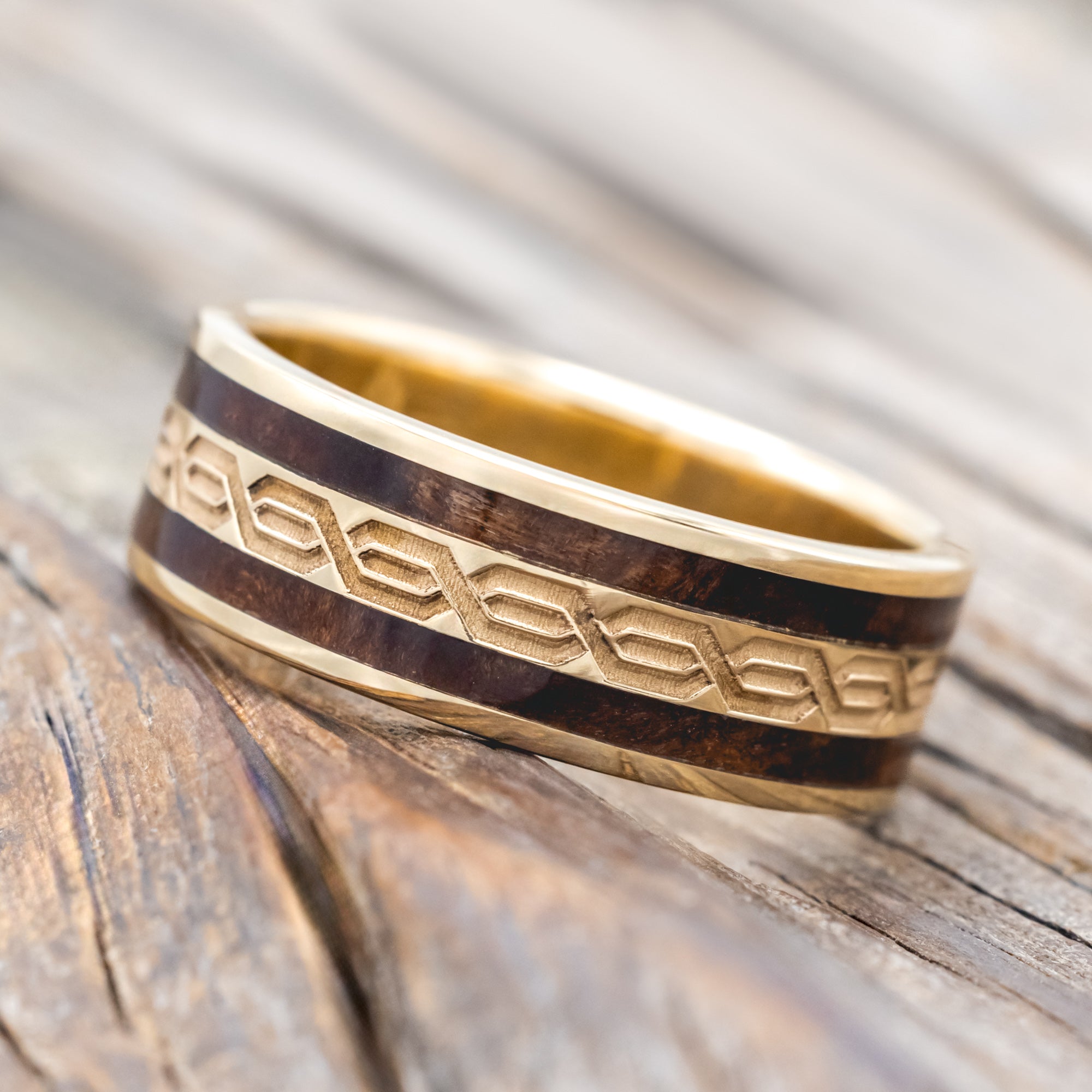 14K gold right with Celtic engravings and redwood inlays