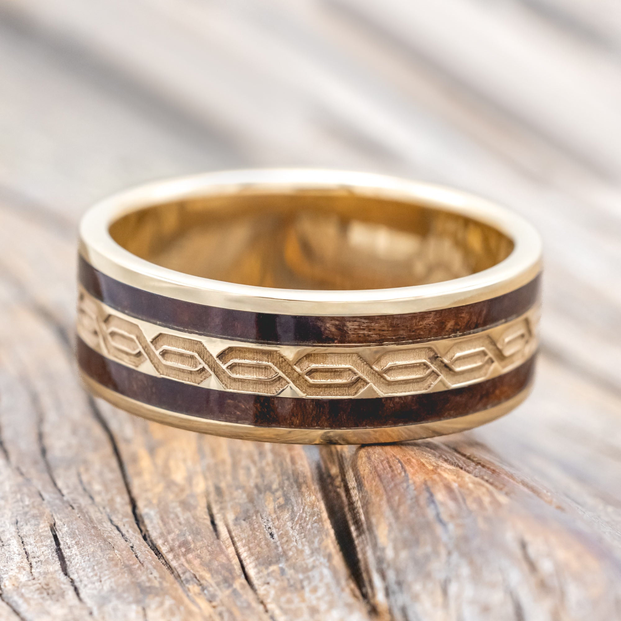 14K gold right with Celtic engravings and redwood inlays
