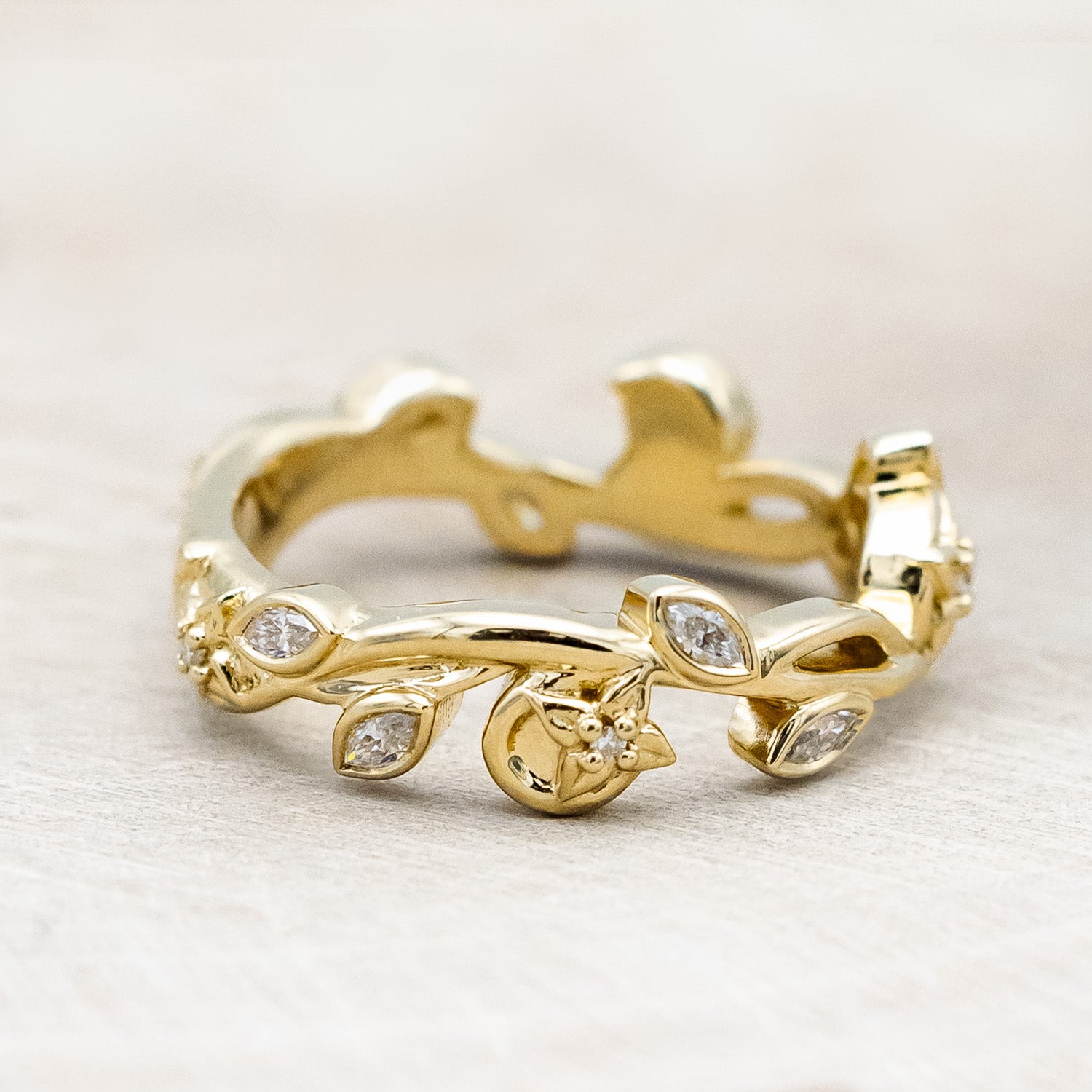 Side view of "Elowen" - sculptural-style vine & floral filigree band with diamond accents