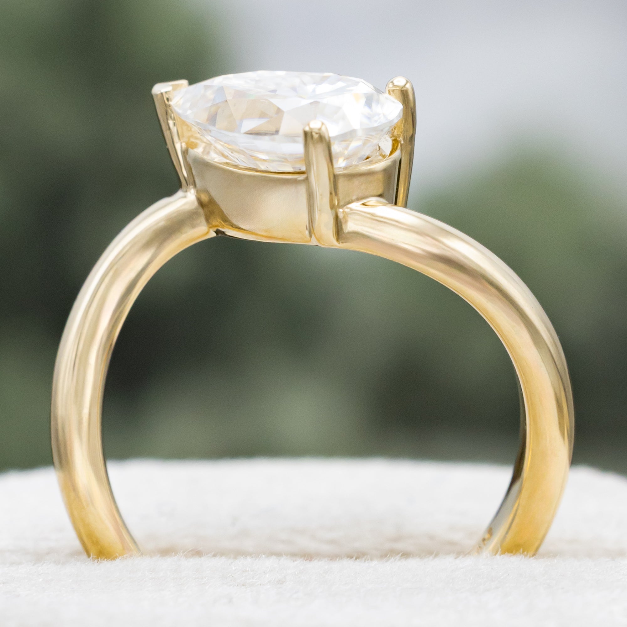 "SYBIL" - PEAR CUT MOISSANITE ASYMMETRICAL ENGAGEMENT RING WITH A GREEN TOURMALINE ACCENTED TRACER-Staghead Designs