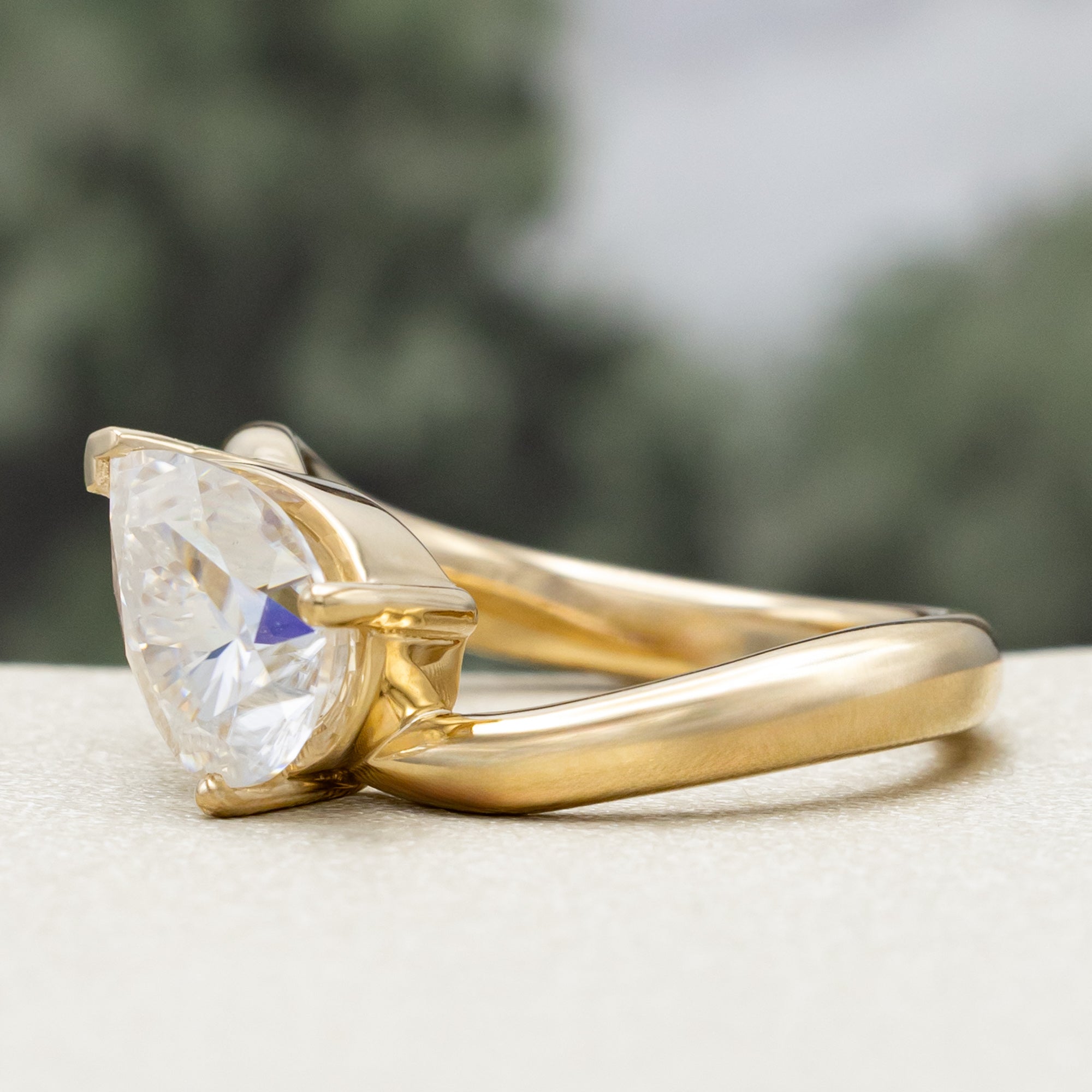 "SYBIL" - PEAR CUT MOISSANITE ASYMMETRICAL ENGAGEMENT RING WITH A GREEN TOURMALINE ACCENTED TRACER-Staghead Designs
