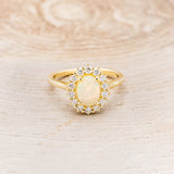OVAL WELO OPAL ENGAGEMENT RING WITH DIAMOND HALO