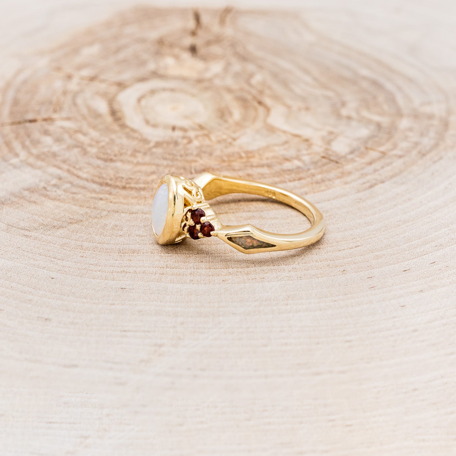 "AGATHA" - BEZEL SET OVAL CABOCHON CUT WHITE OPAL ENGAGEMENT RING WITH GARNET ACCENTS AND FIRE & ICE OPAL INLAYS-Staghead Designs