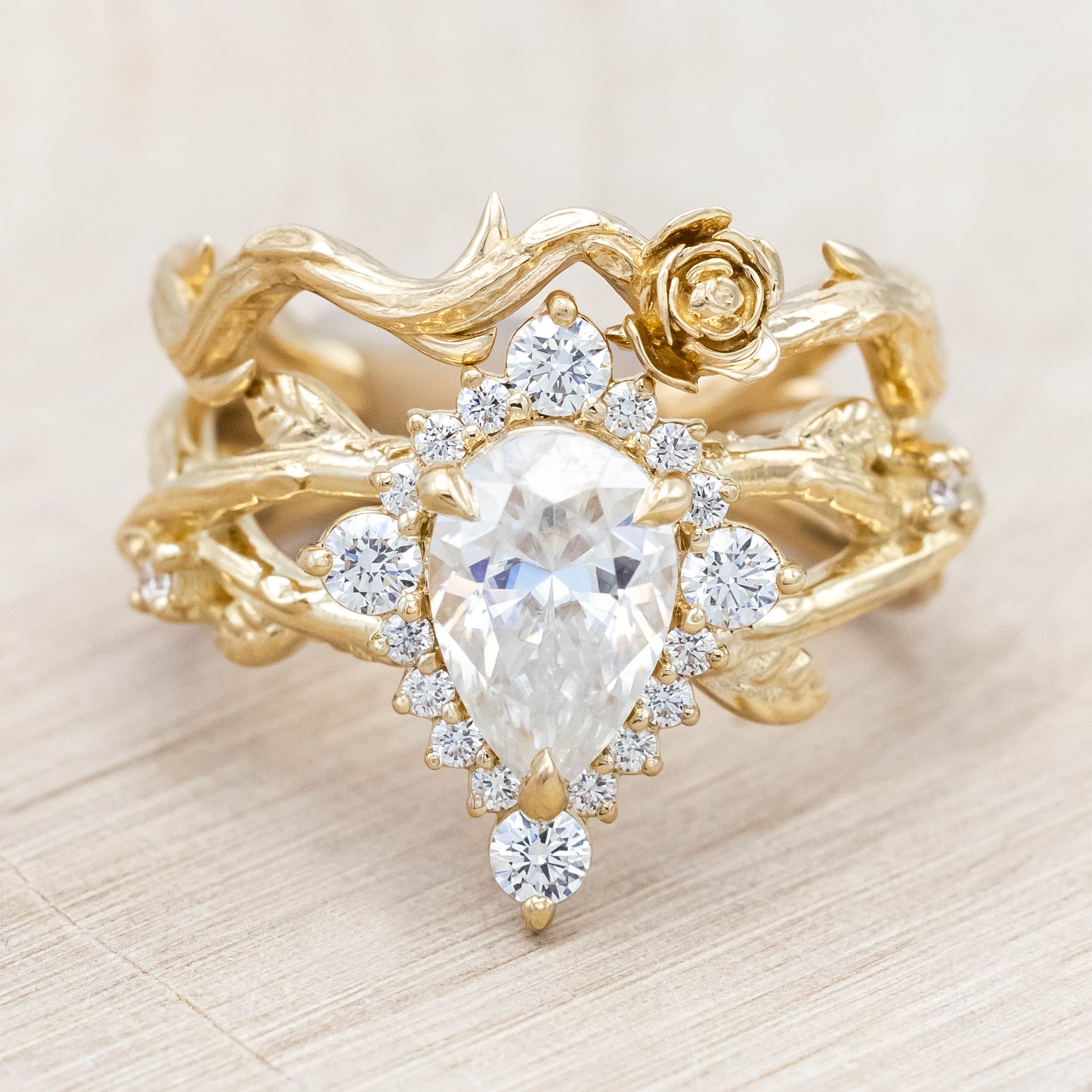 "ARTEMIS ON THE VINE DIVINE" - PEAR ENGAGEMENT RING WITH DIAMOND ACCENTS & A BRANCH-STYLE BAND-Staghead Designs