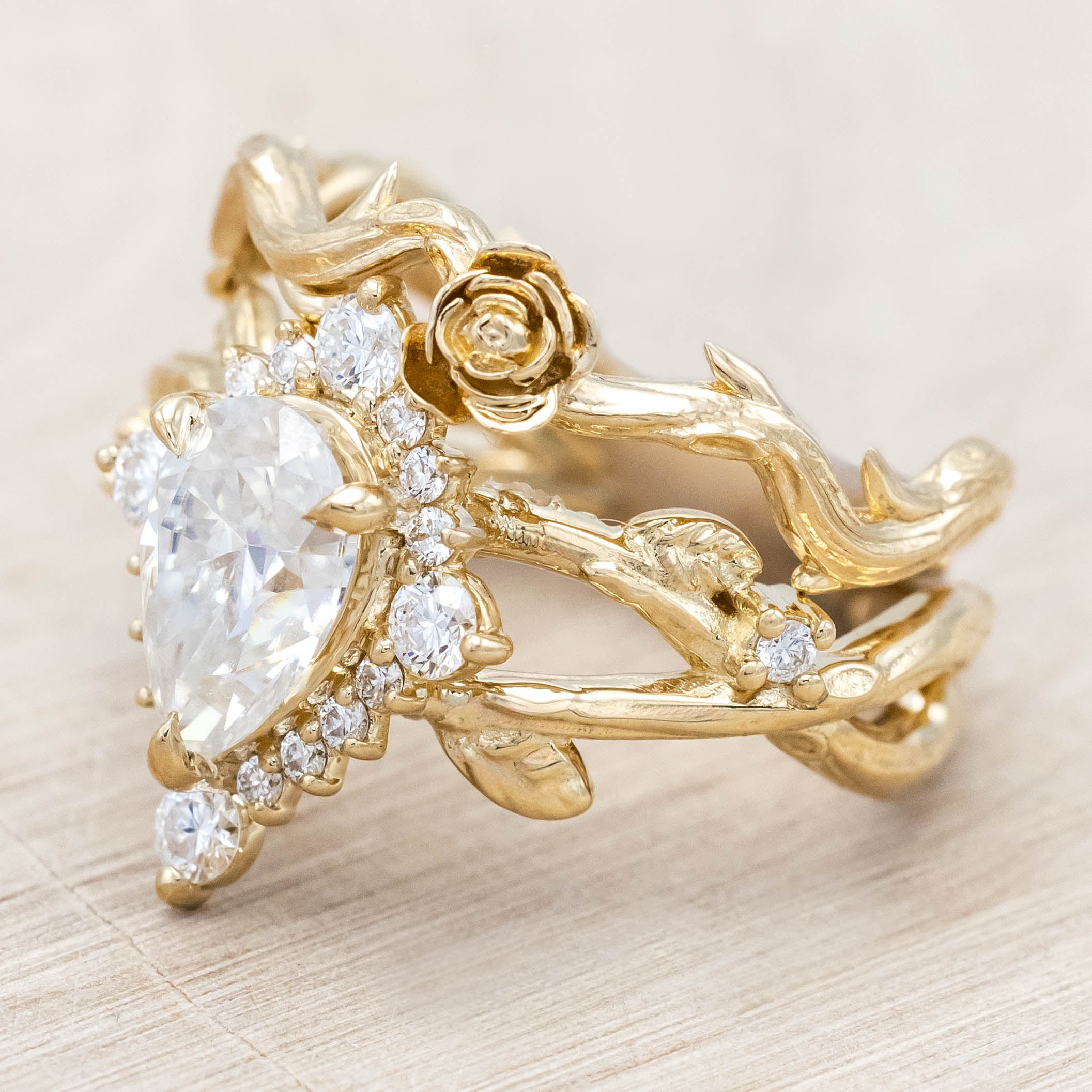 "ARTEMIS ON THE VINE DIVINE" - PEAR ENGAGEMENT RING WITH DIAMOND ACCENTS & A BRANCH-STYLE BAND-Staghead Designs