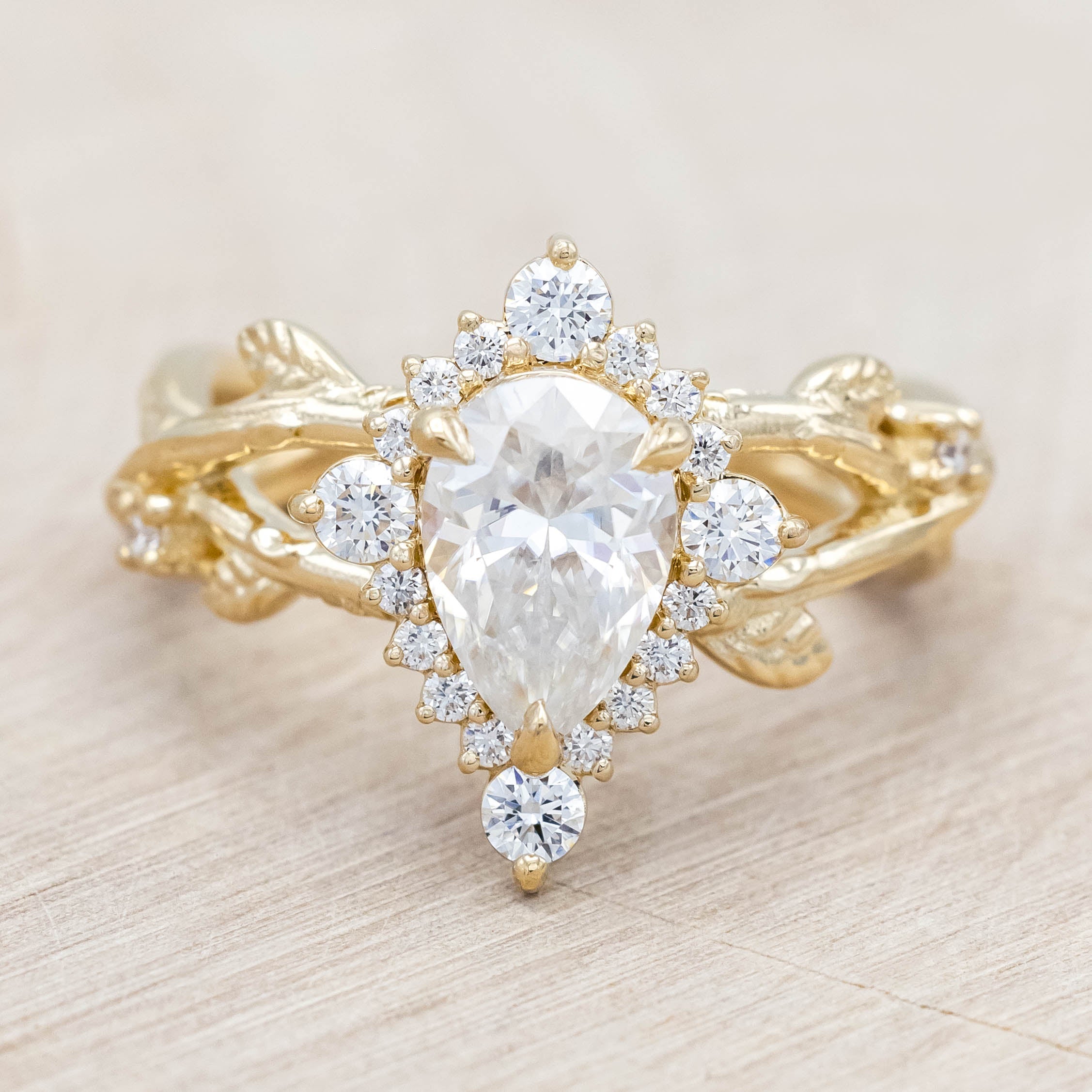 "ARTEMIS ON THE VINE DIVINE" - PEAR ENGAGEMENT RING WITH DIAMOND ACCENTS & A BRANCH-STYLE BAND-Staghead Designs