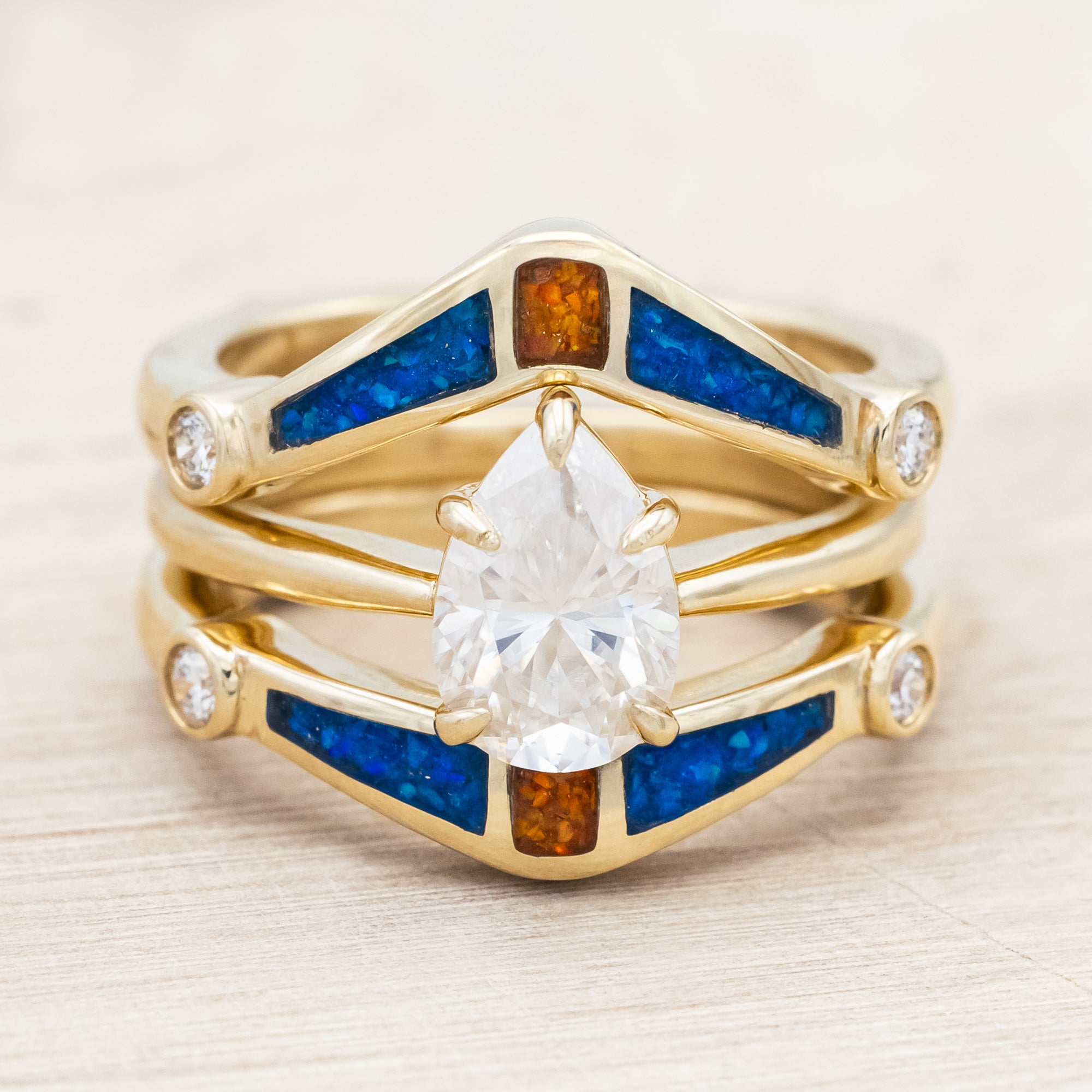 SOLITAIRE PEAR CUT MOISSANITE ENGAGEMENT RING WITH ORANGE & BLUE OPAL INLAID RING GUARD-Staghead Designs