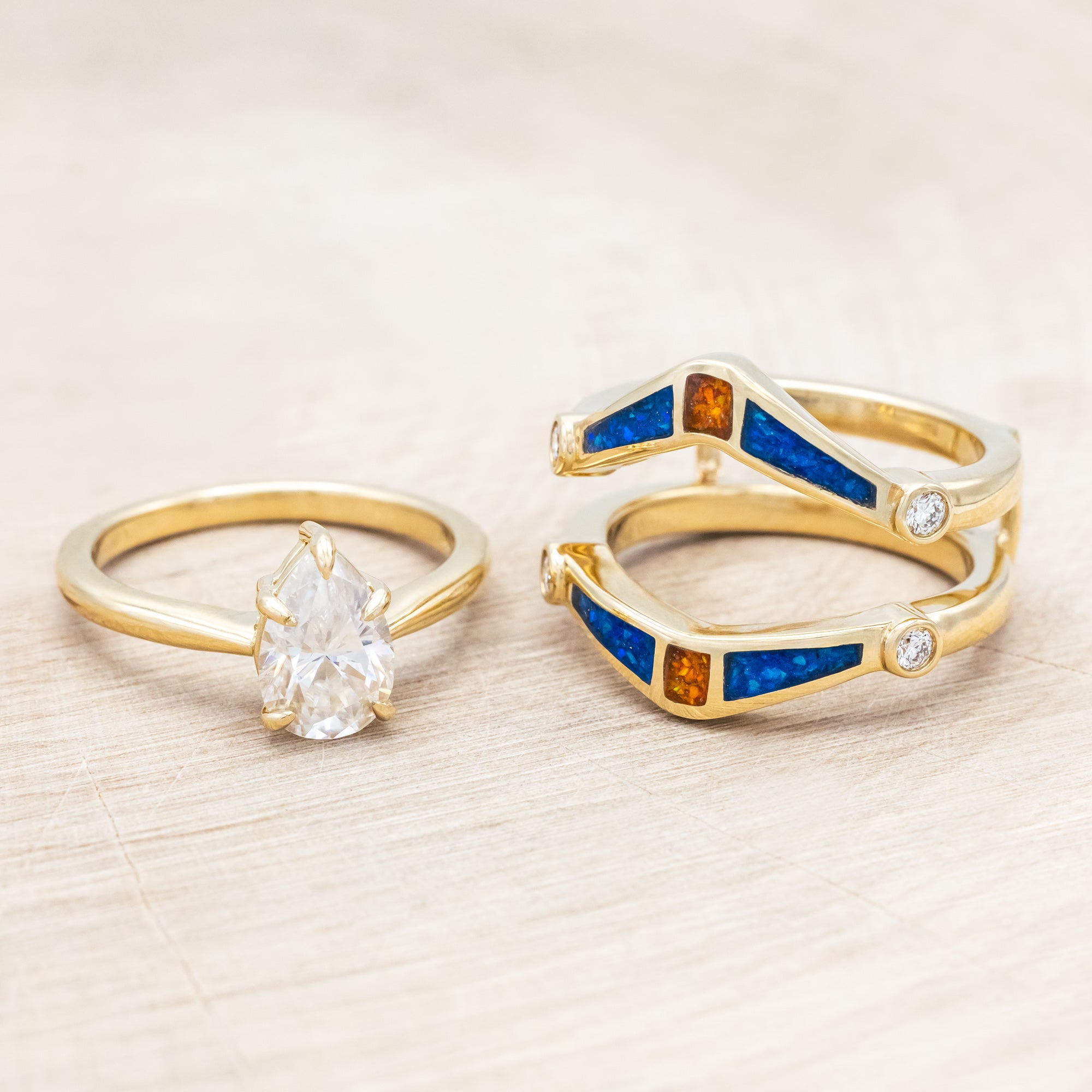 SOLITAIRE PEAR CUT MOISSANITE ENGAGEMENT RING WITH ORANGE & BLUE OPAL INLAID RING GUARD-Staghead Designs