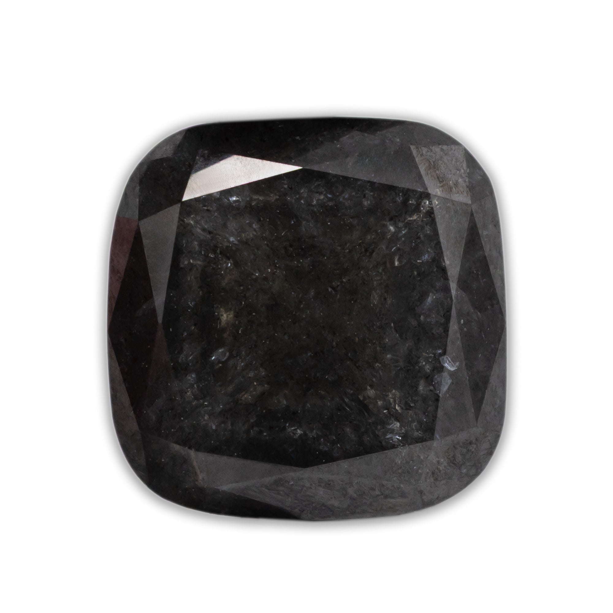 Cushion cut salt & pepper diamond on a white background