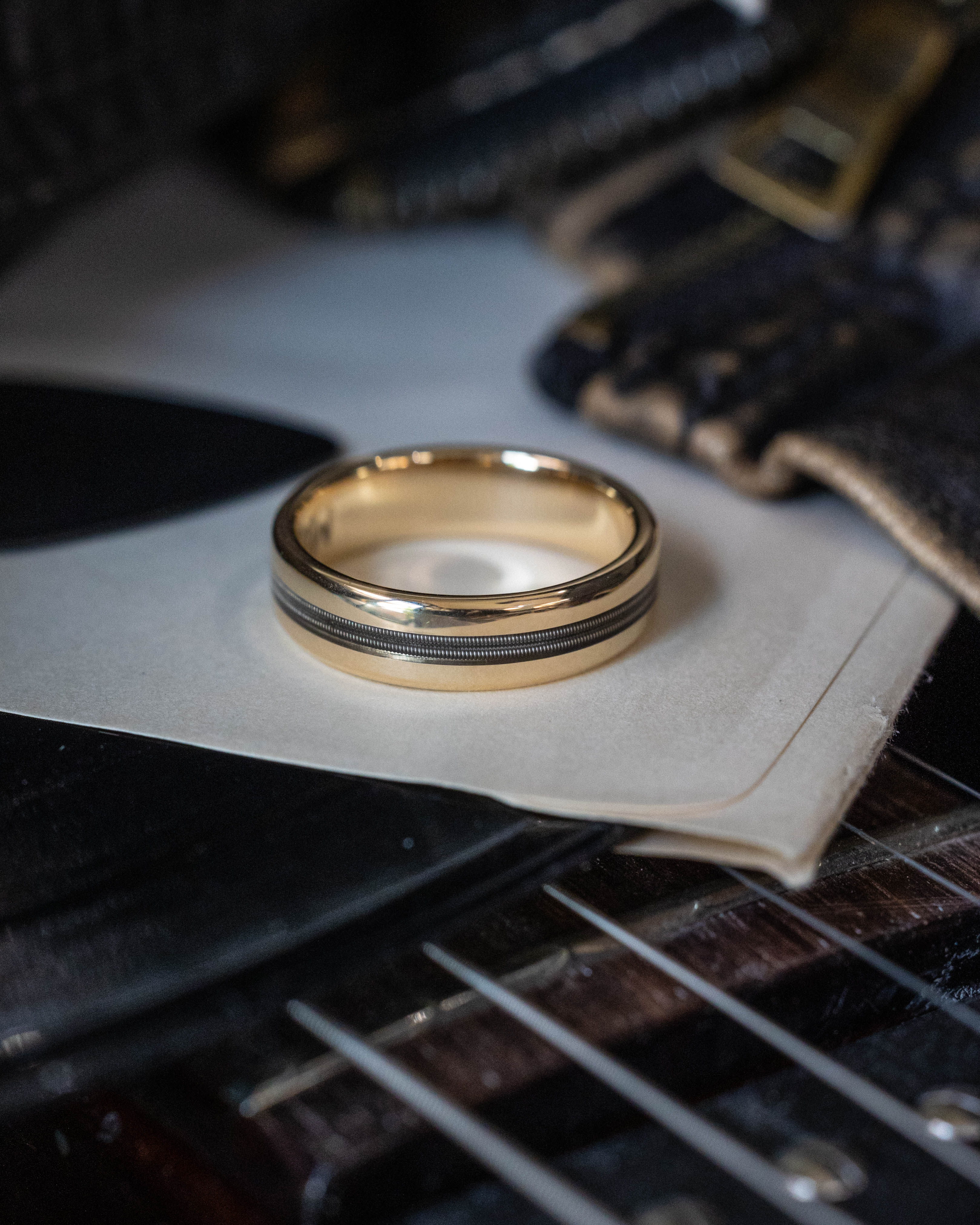 "NIRVANA" - CENTERED GUITAR STRING WEDDING BAND-Staghead Designs