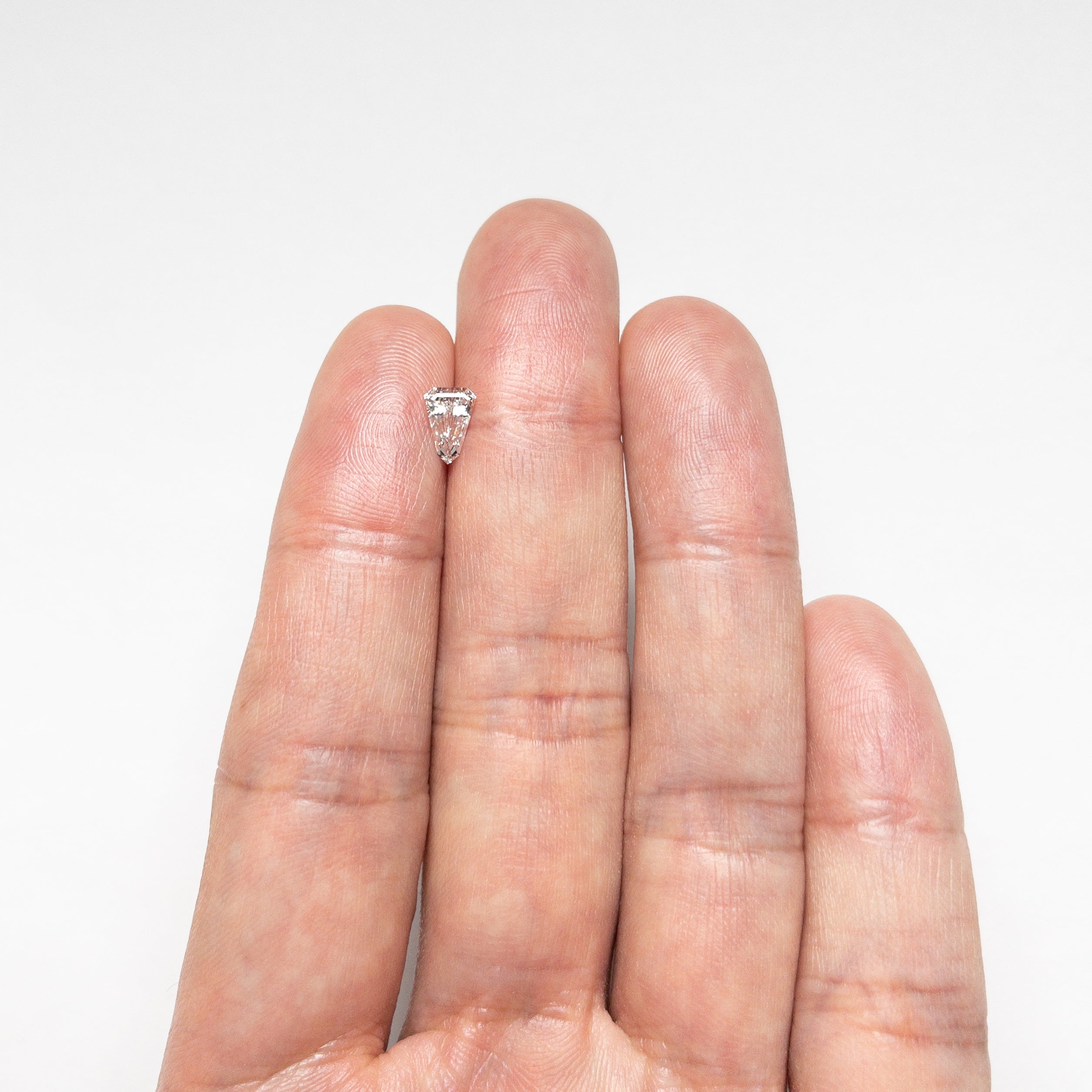 0.55ct 7.13x4.85x2.66mm VS2 F Shield Step Cut 19677-03-Staghead Designs