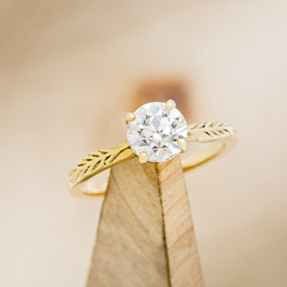 "HOPE" - ROUND CUT MOISSANITE SOLITAIRE ENGAGEMENT RING WITH FEATHER ACCENTS-13